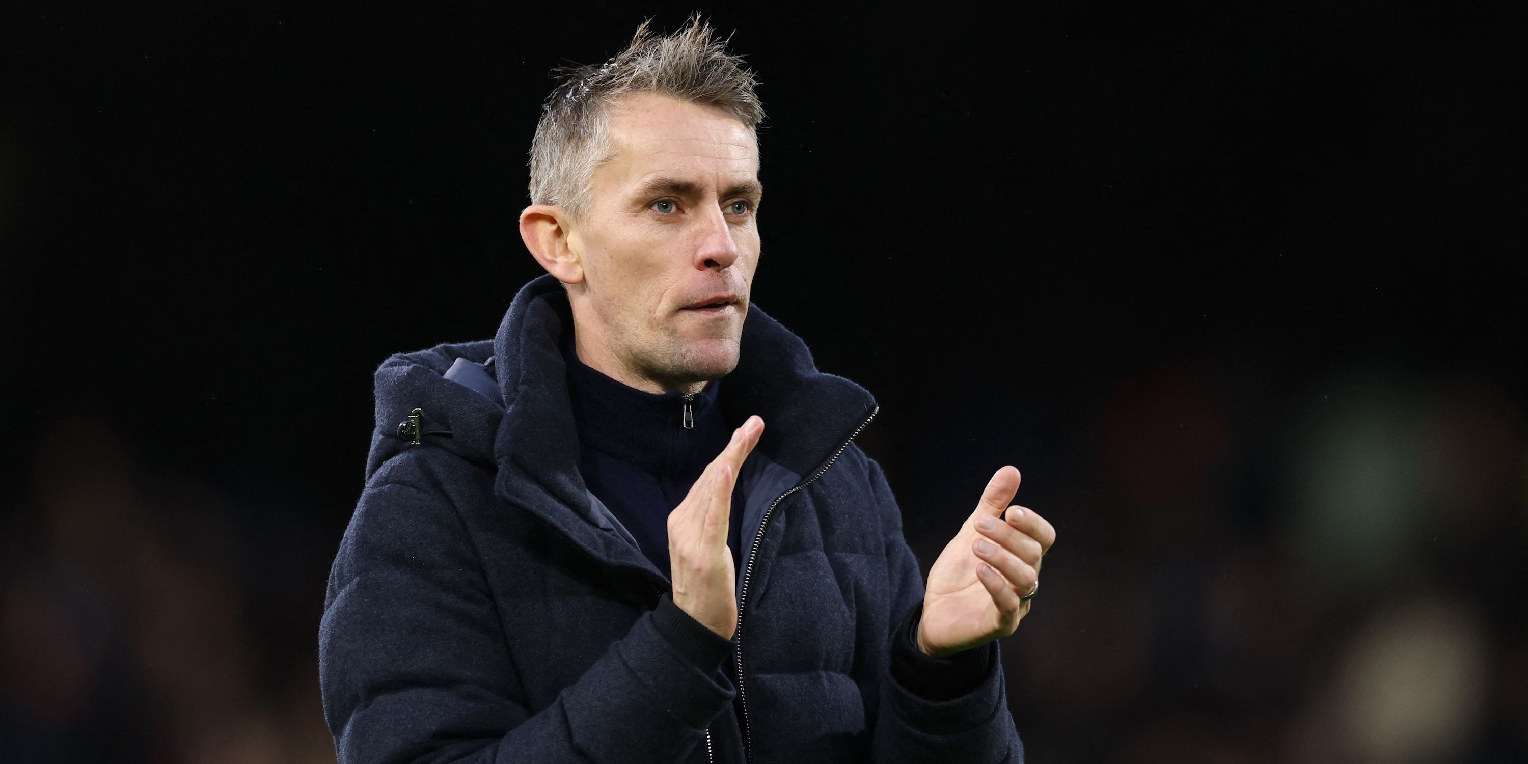 Ipswich Town manager Kieran McKenna applauds fans after the match