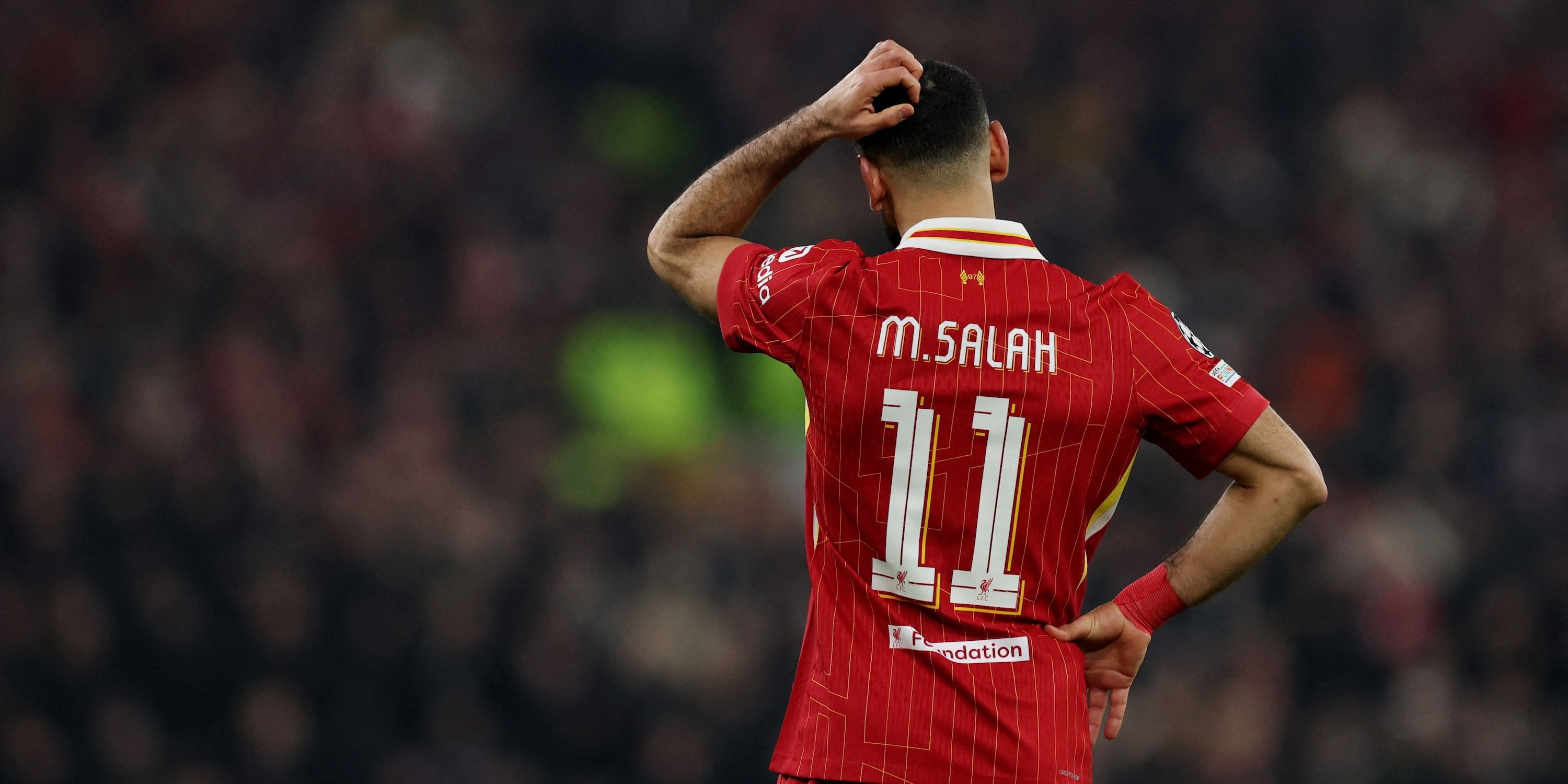 Liverpool's Mohamed Salah reacts during the match