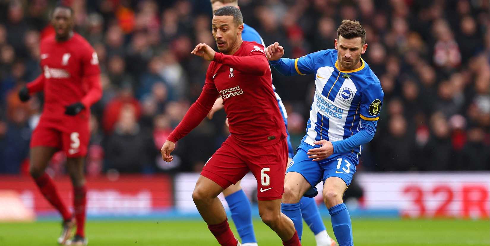  Liverpool's Thiago Alcantara in action with Brighton & Hove Albion's Pascal Gross