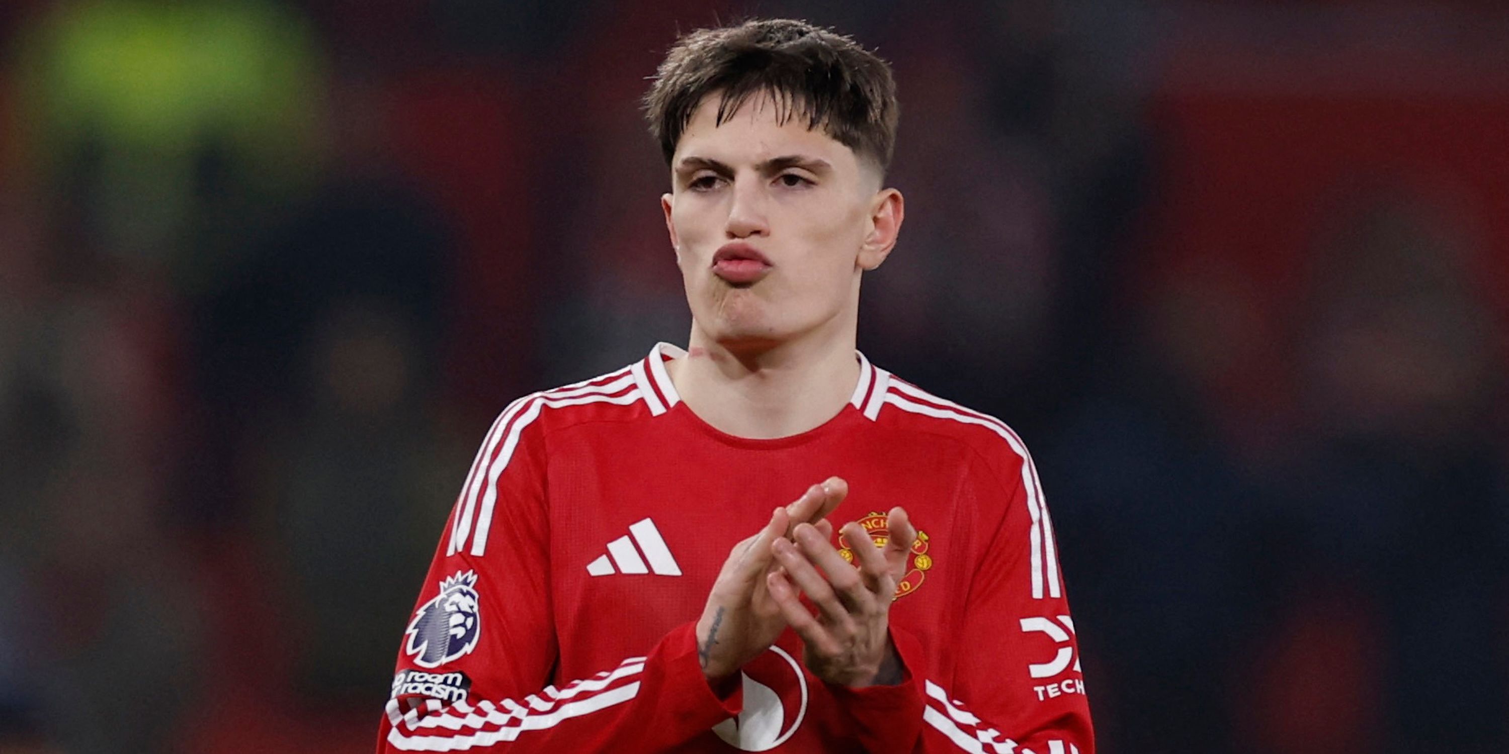 Manchester United's Alejandro Garnacho applauds fans - 1