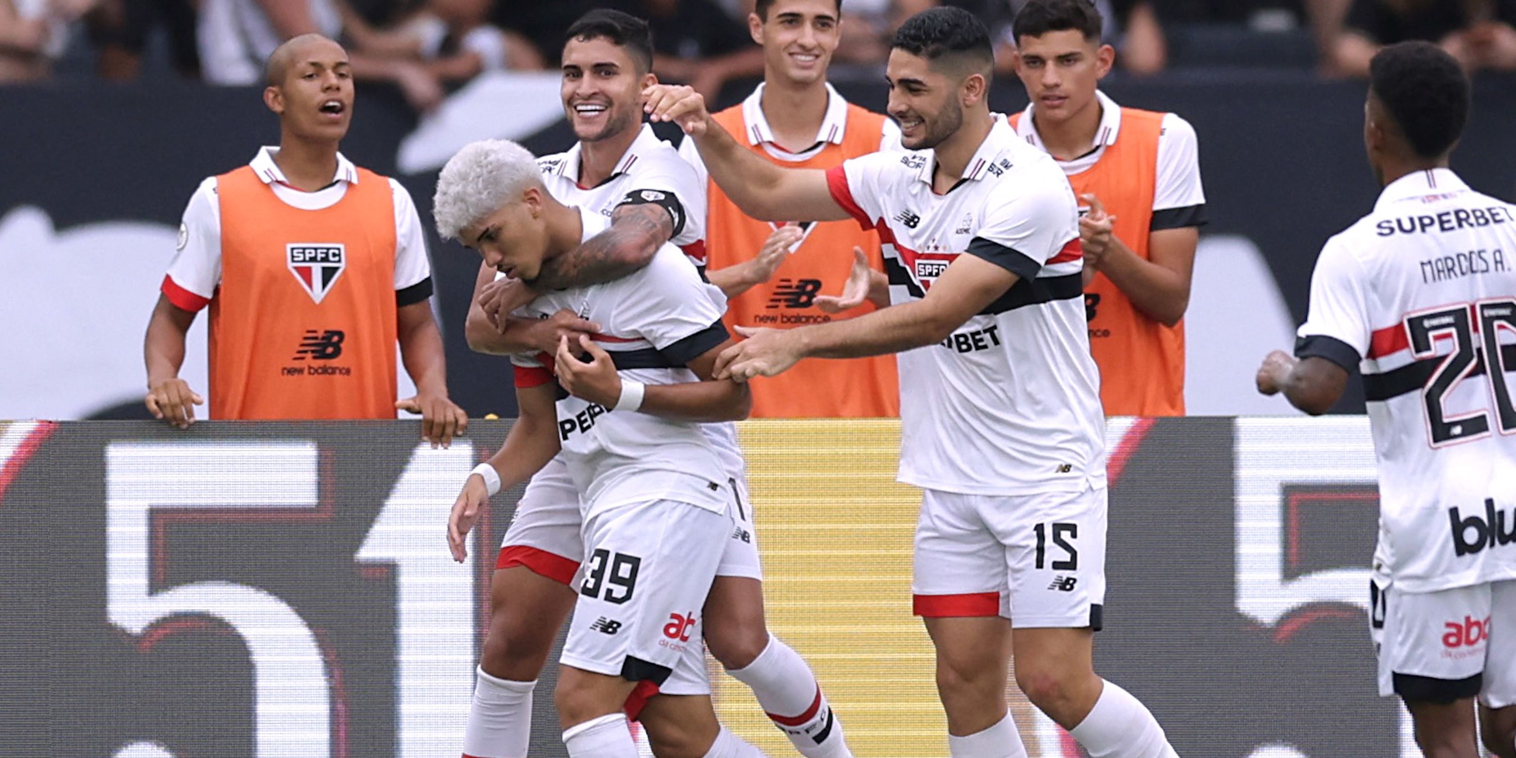 Sao Paulo's William Gomes celebrates with team mates after scoring their first goal