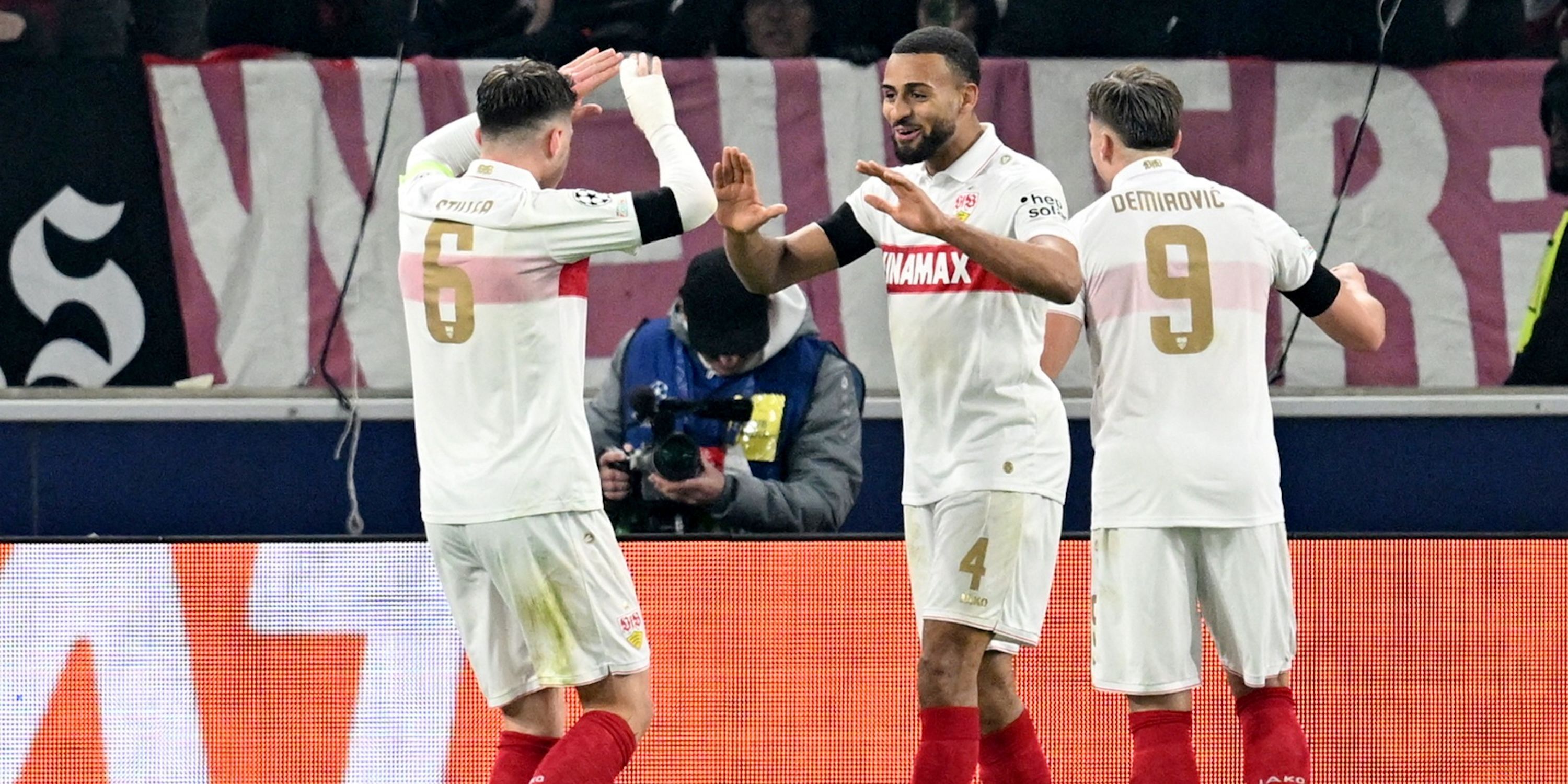 VfB Stuttgart's Josha Vagnoman celebrates scoring their fourth goal with Angelo Stiller and Ermedin Demirovic