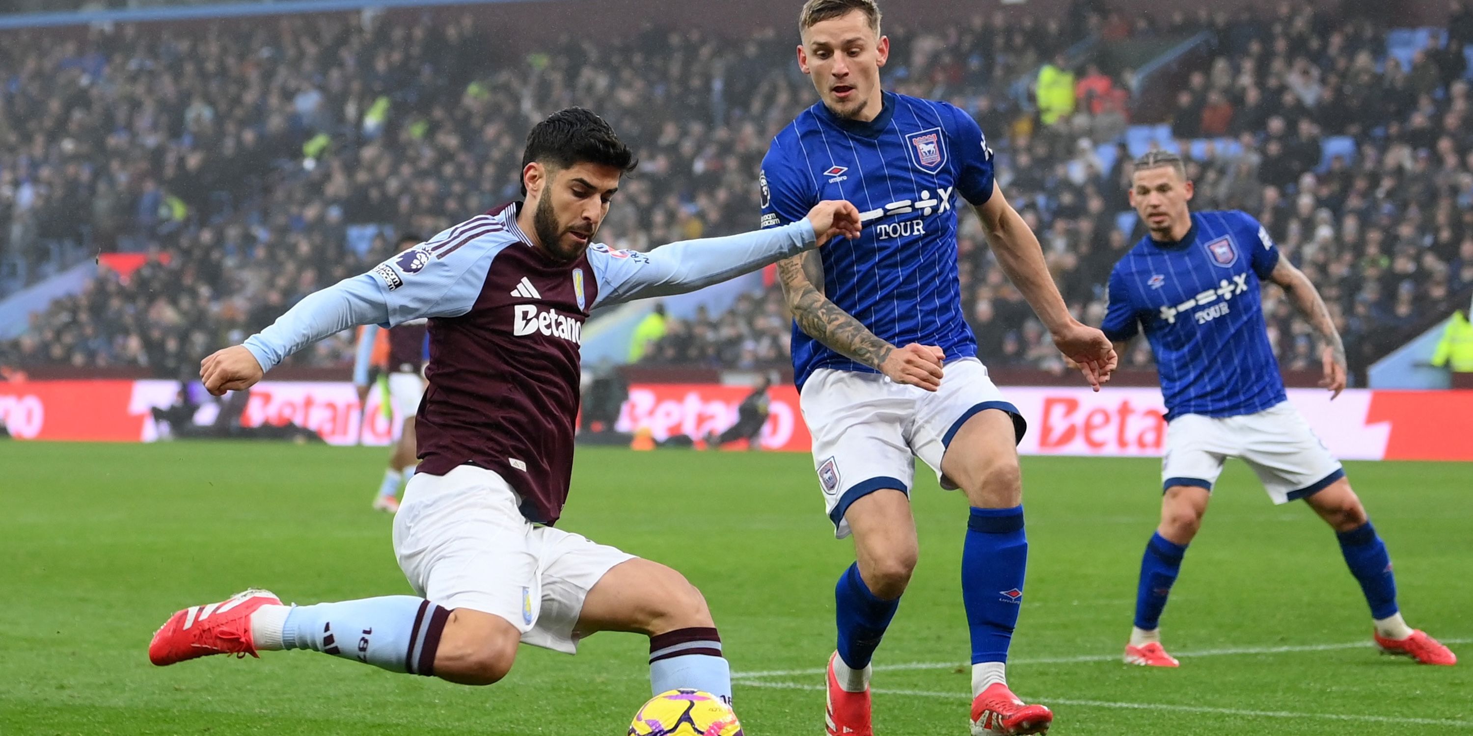 Aston Villa's Marco Asensio in action with Ipswich Town's Luke Woolfenden