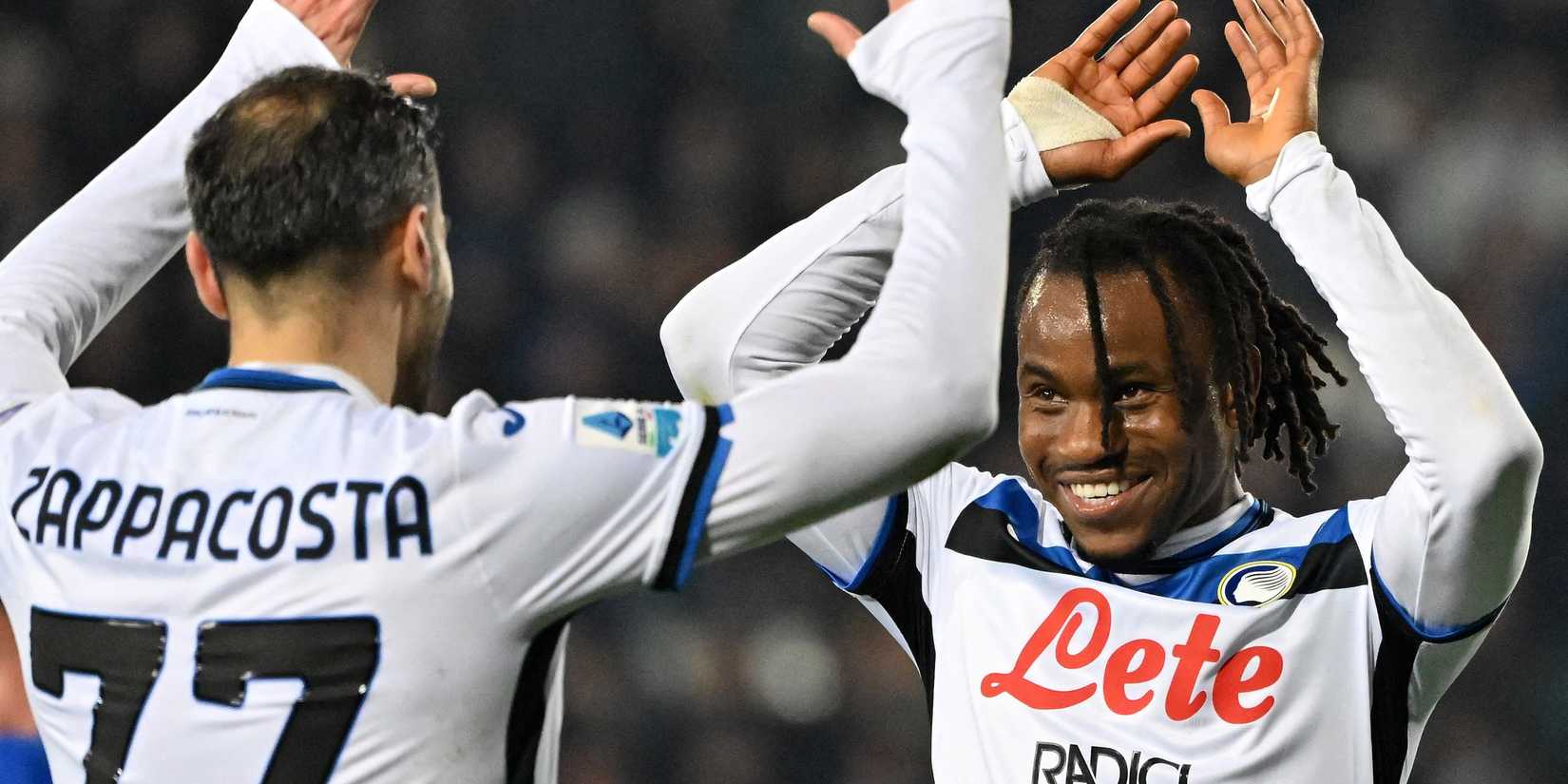 Atalanta's Davide Zappacosta celebrates scoring their fifth goal with Ademola Lookman