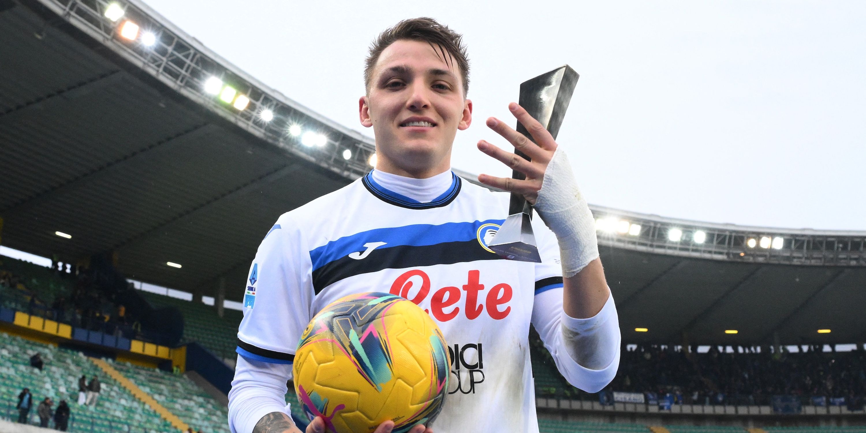 Atalanta's Mateo Retegui celebrates with the match ball