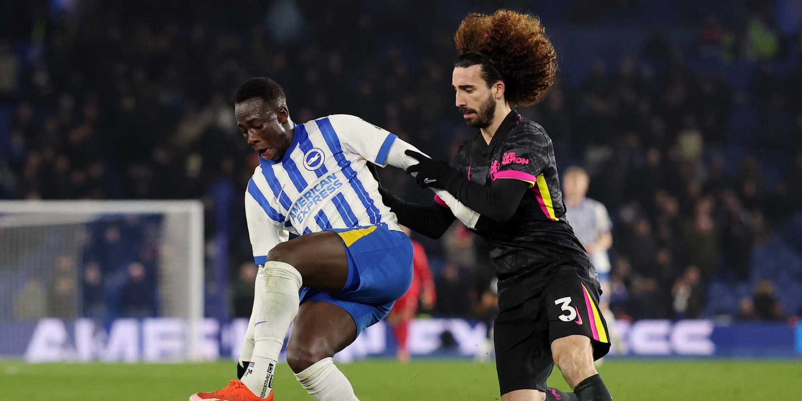 Brighton & Hove Albion's Yankuba Minteh in action with Chelsea's Marc Cucurella