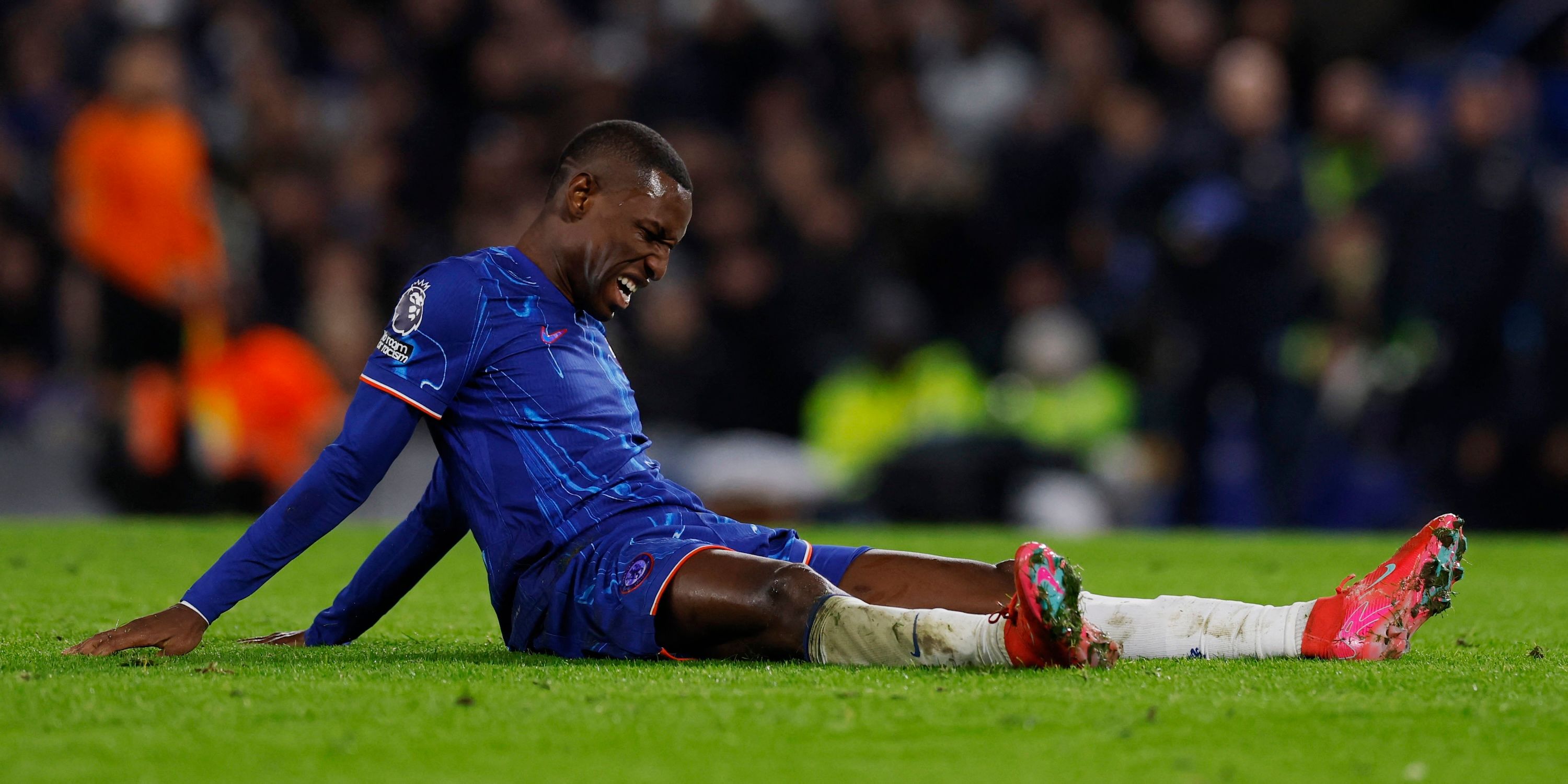 Chelsea's Nicolas Jackson reacts after sustaining an injury