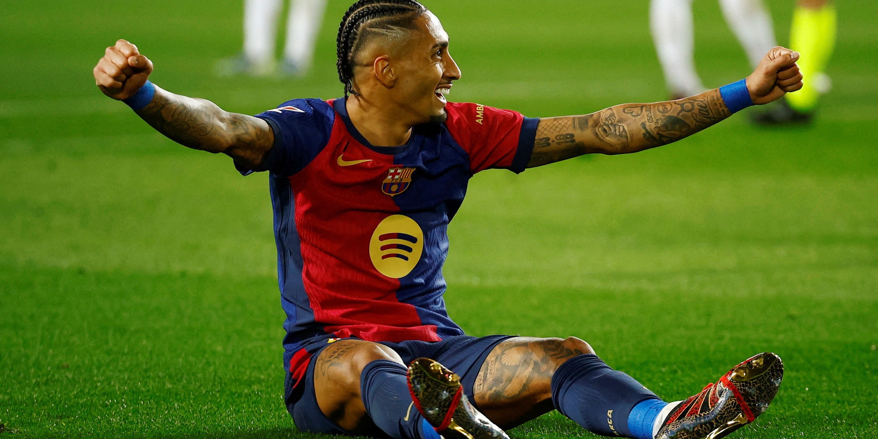 FC Barcelona's Raphinha celebrates after Fermin Lopez scored their fifth goal