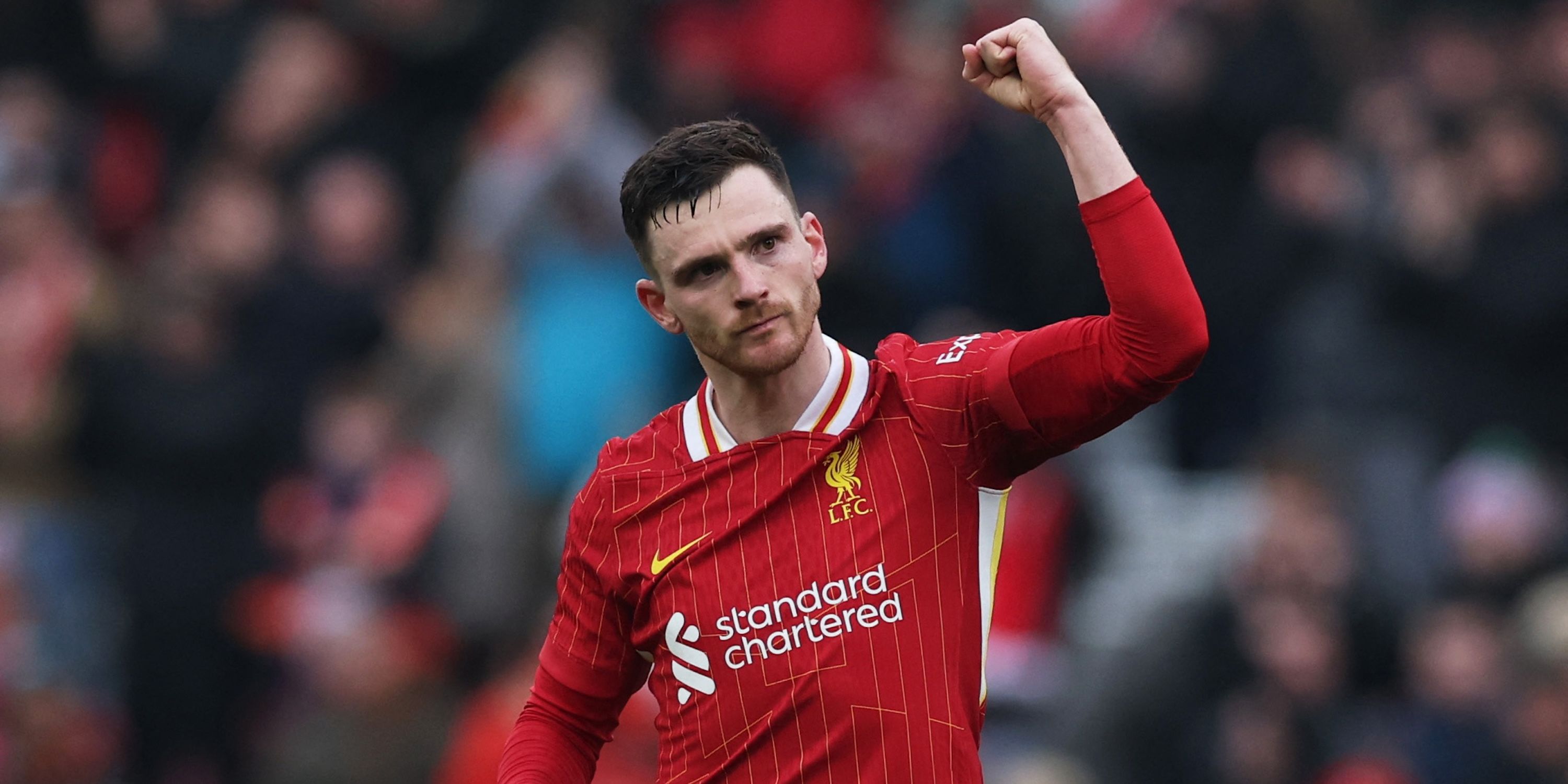 Liverpool's Andrew Robertson celebrates after the match