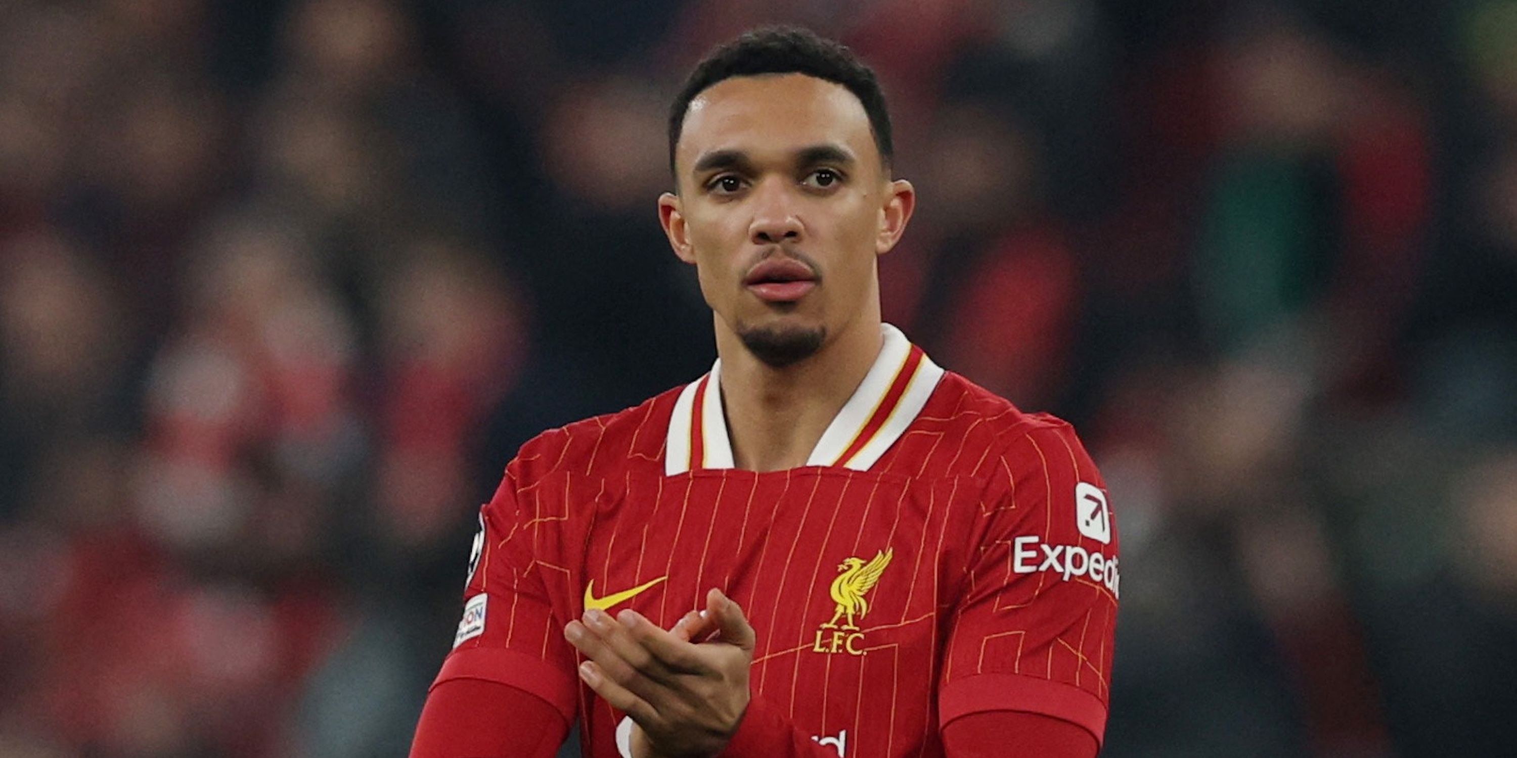 Liverpool's Trent Alexander-Arnold applauds fans after the race