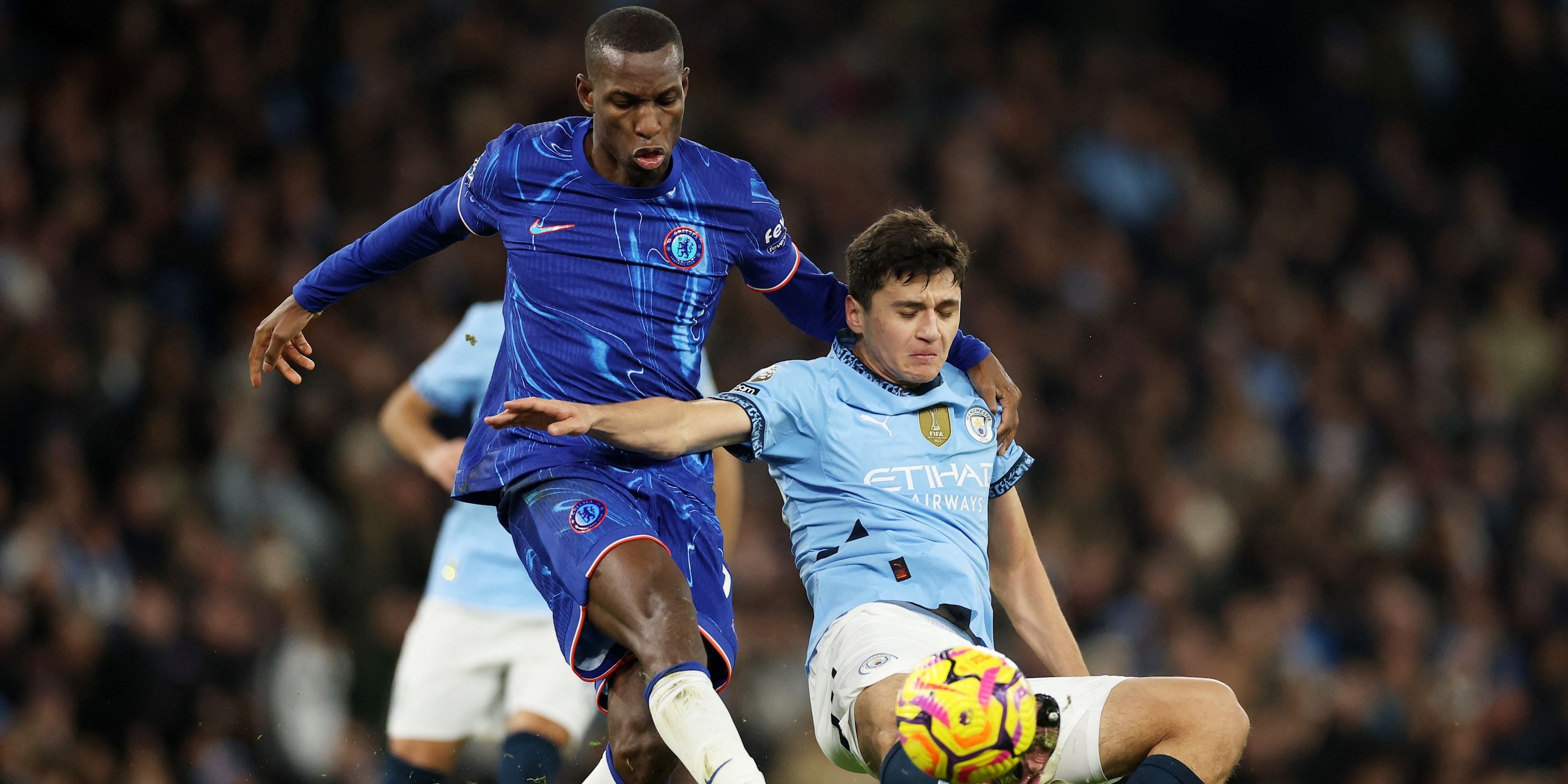 Manchester City's Abdukodir Khusanov in action with Chelsea's Nicolas Jackson