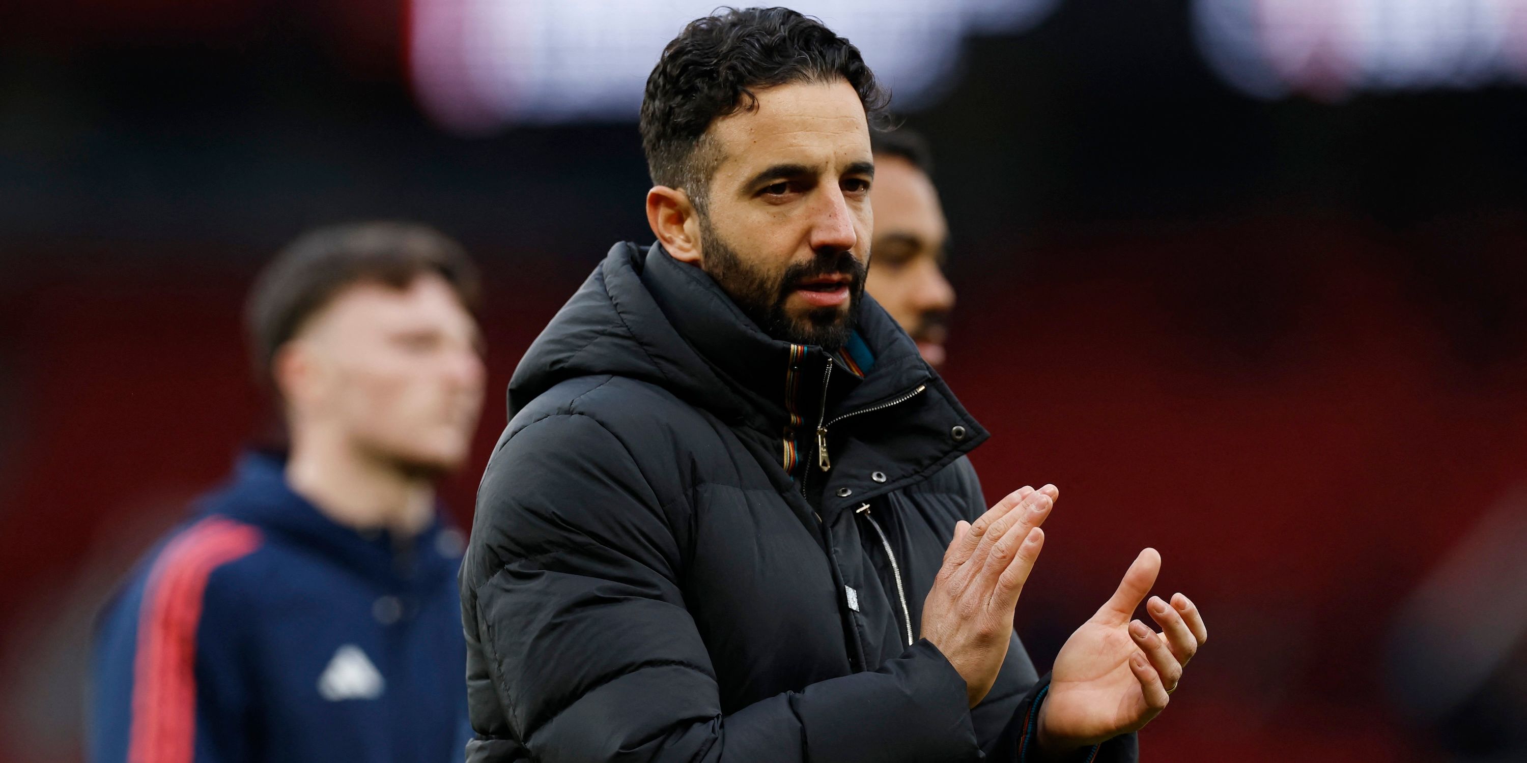 Manchester United manager Ruben Amorim welcomes fans after the match