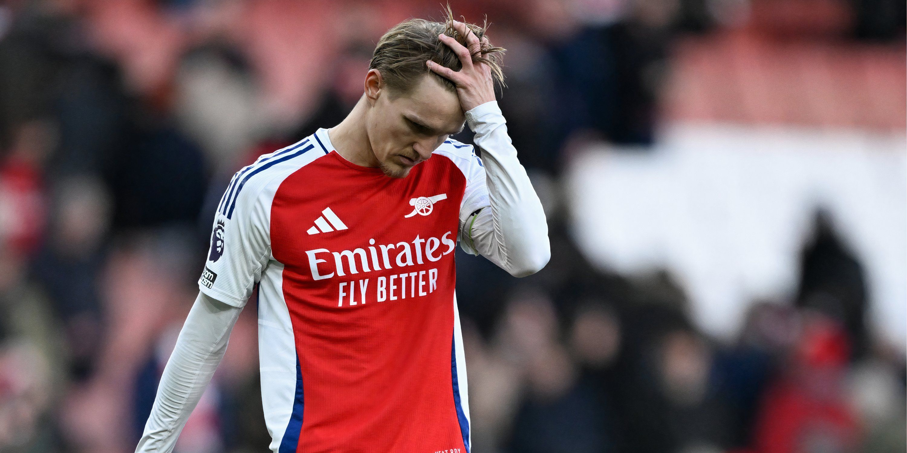 Martin Odegaard looks dejected for Arsenal