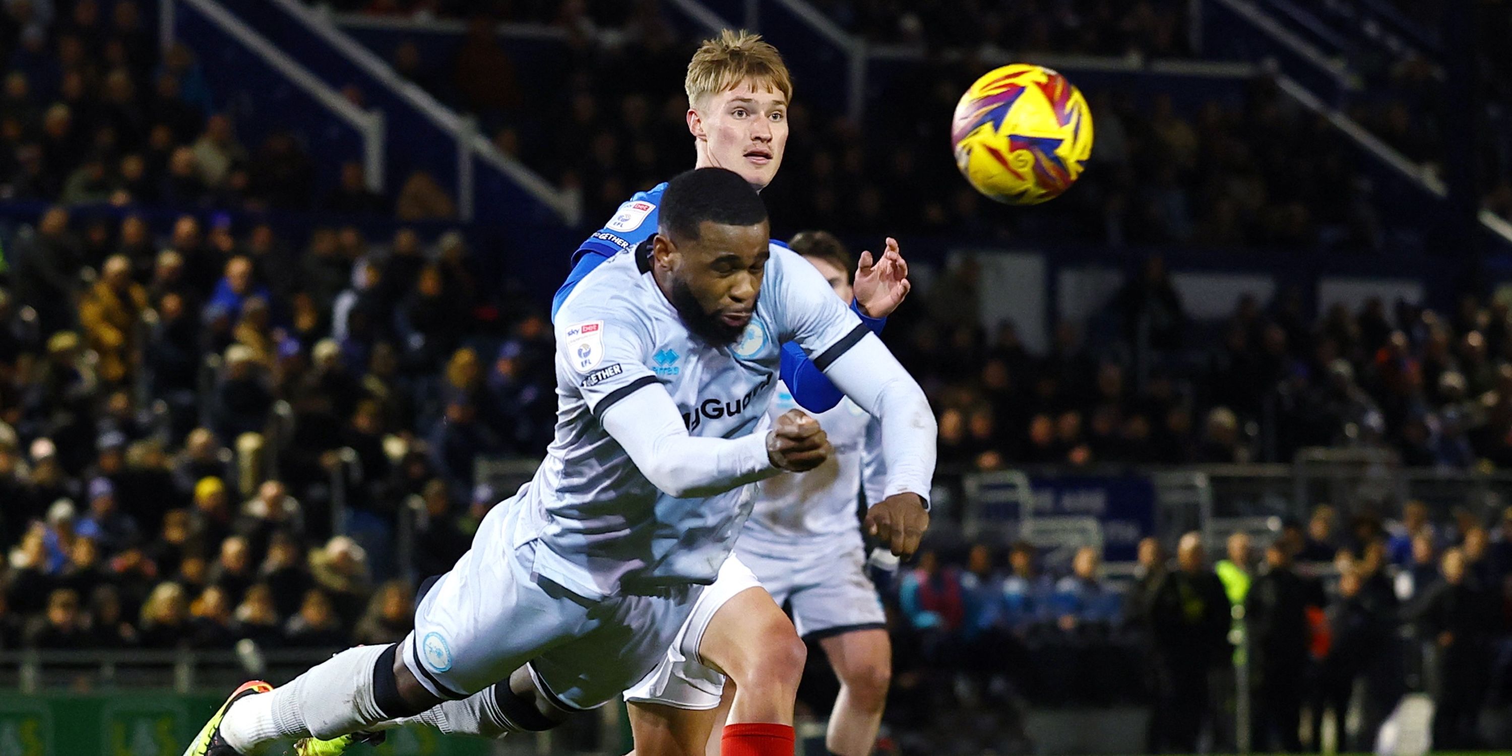 Millwall's Japhet Tanganga in action with Portsmouth's Thomas Waddingham