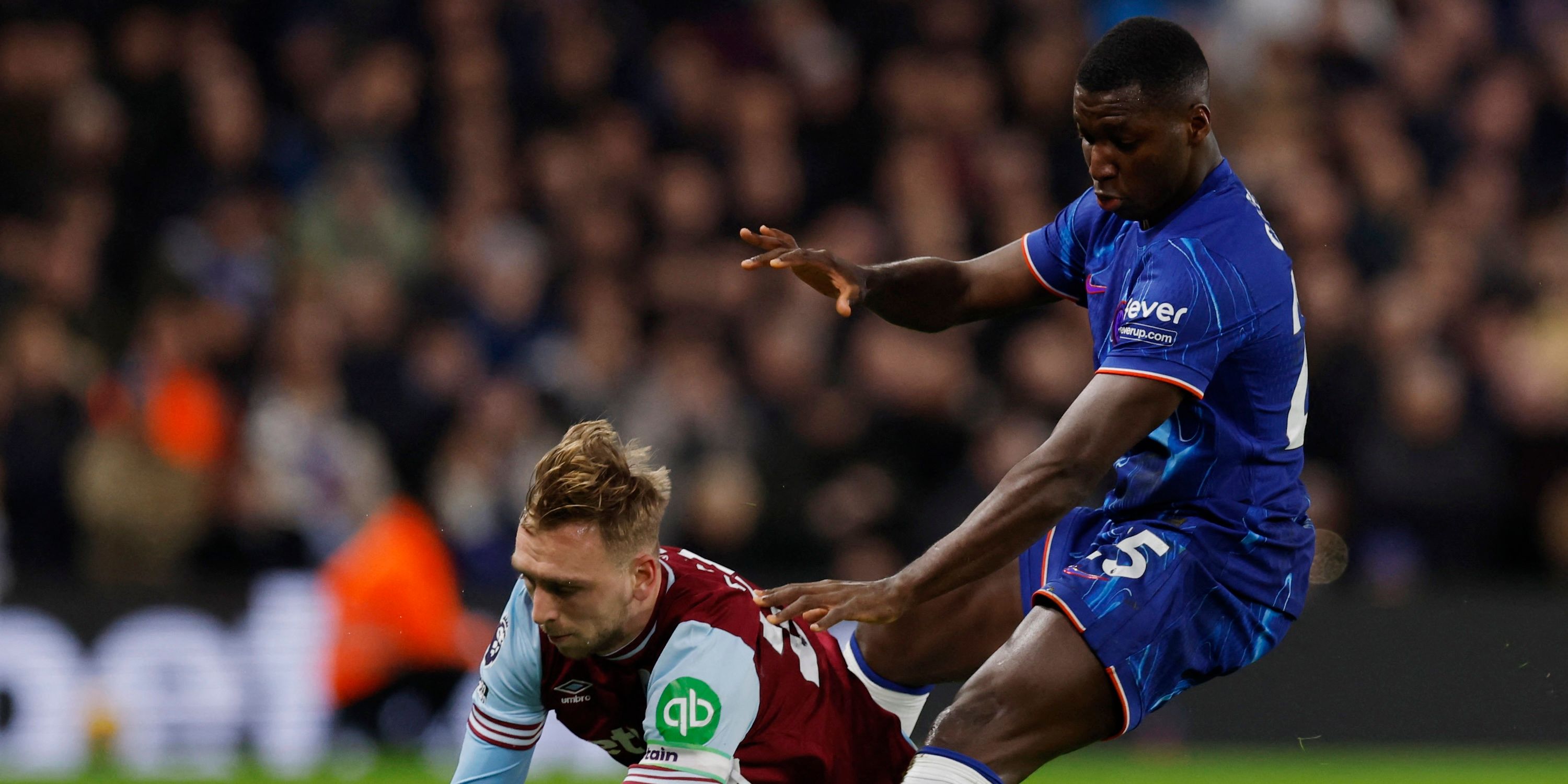 West Ham United's Jarrod Bowen in action with Chelsea's Moises Caicedo