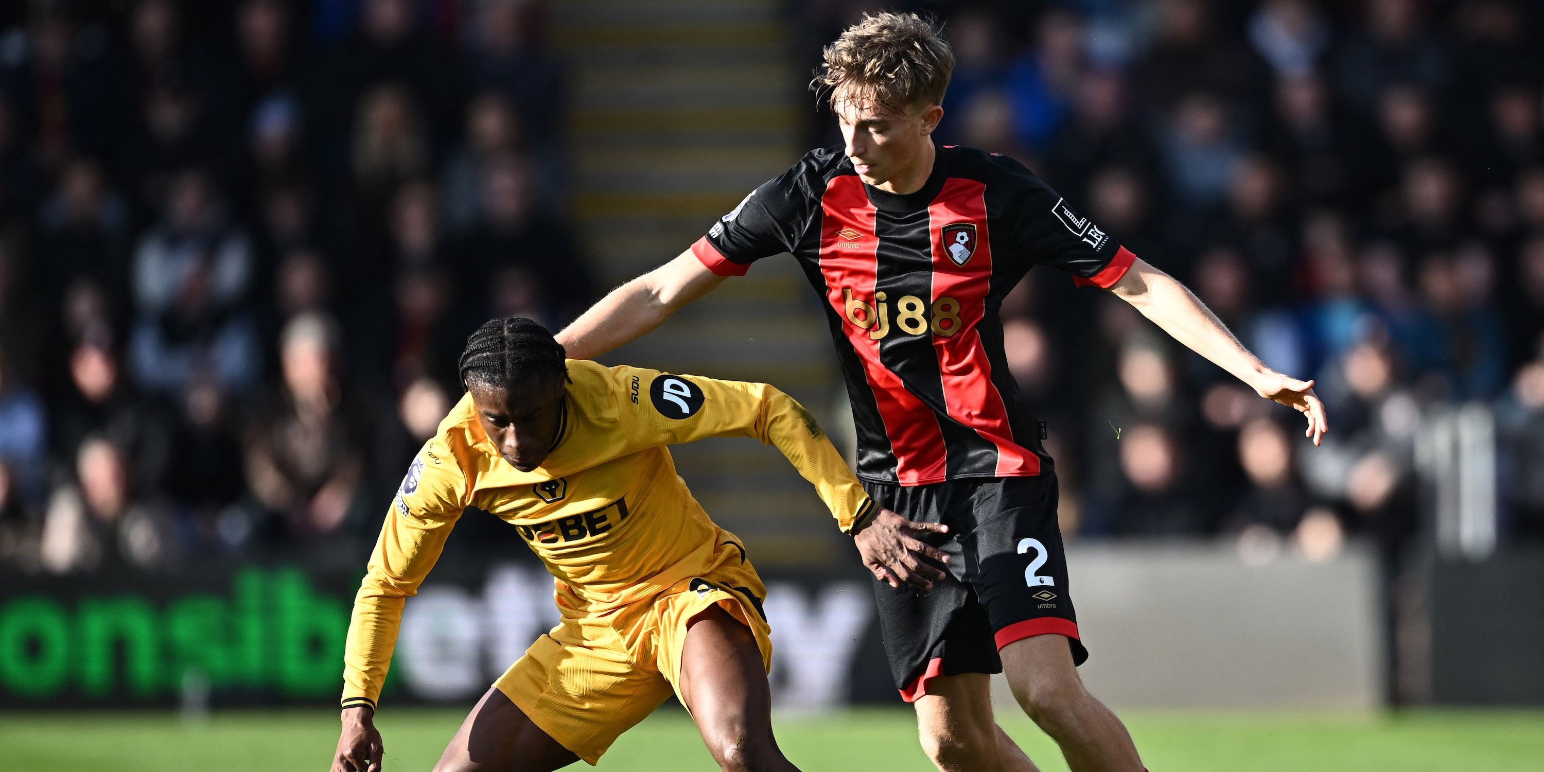 Wolverhampton Wanderers' Jean-Ricner Bellegarde in action with AFC Bournemouth's Dean Huijsen