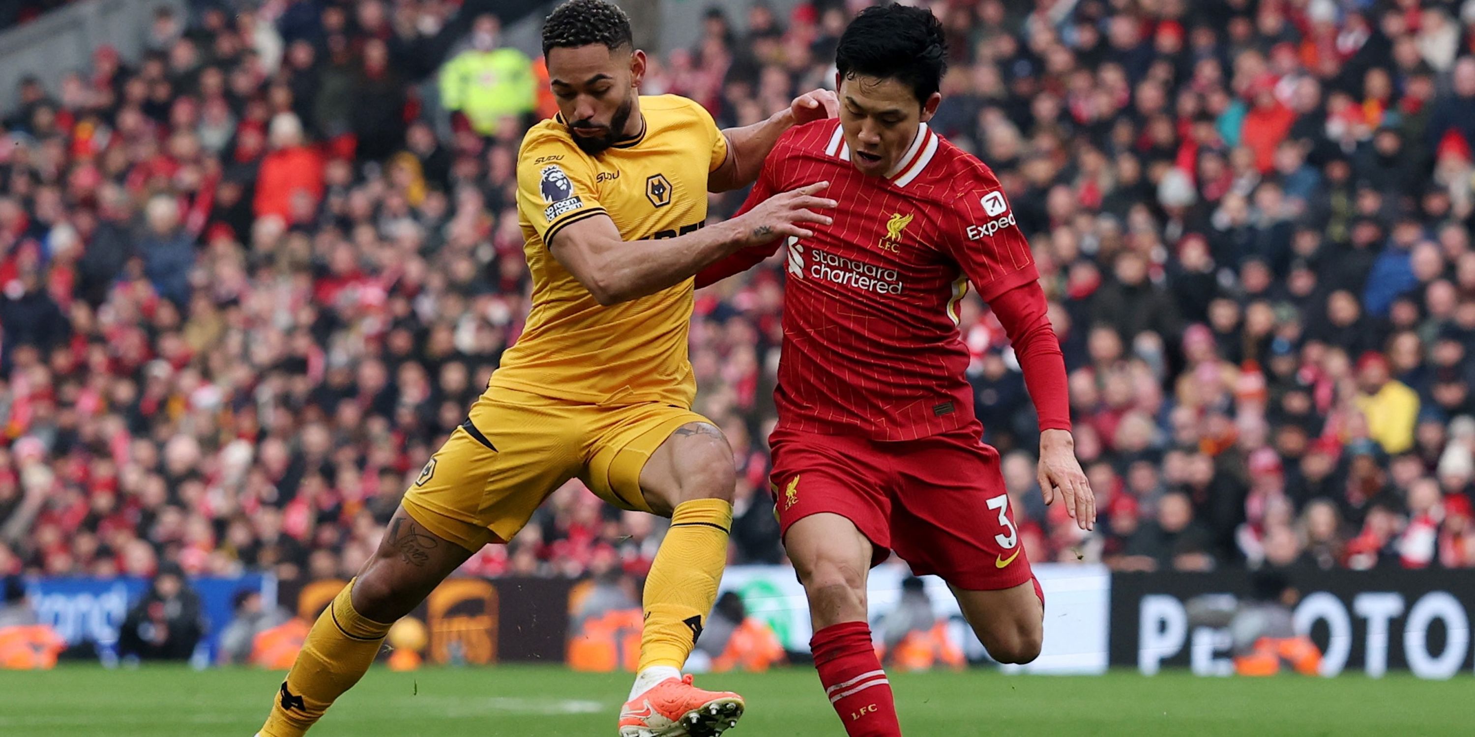 Wolverhampton Wandeers' Matheus Cunha at work with Liverpool and Wattaro Endo