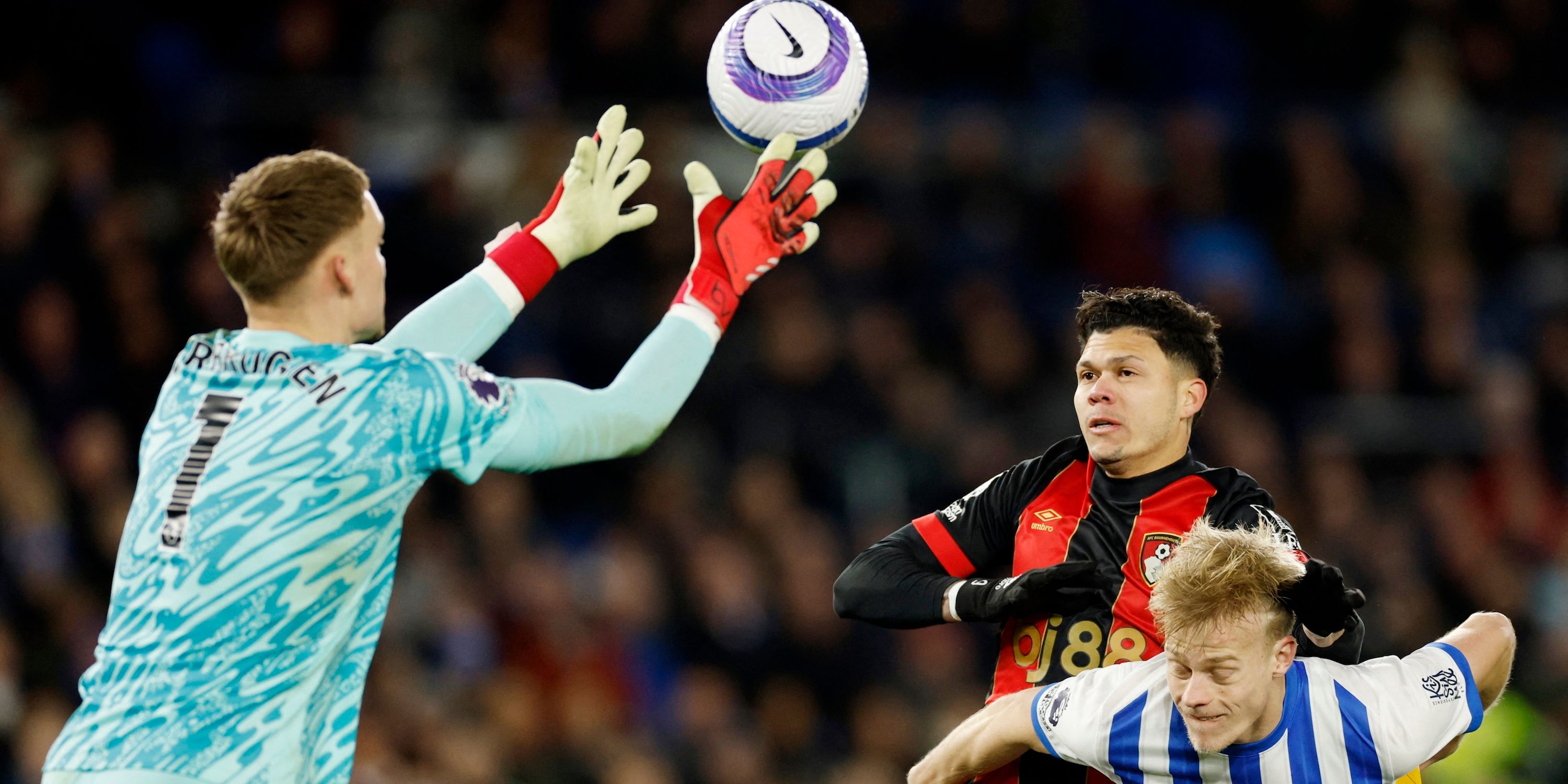 AFC Bournemouth's Evanilson in action with Brighton & Hove Albion's Bart Verbruggen and Jan Paul van Hecke