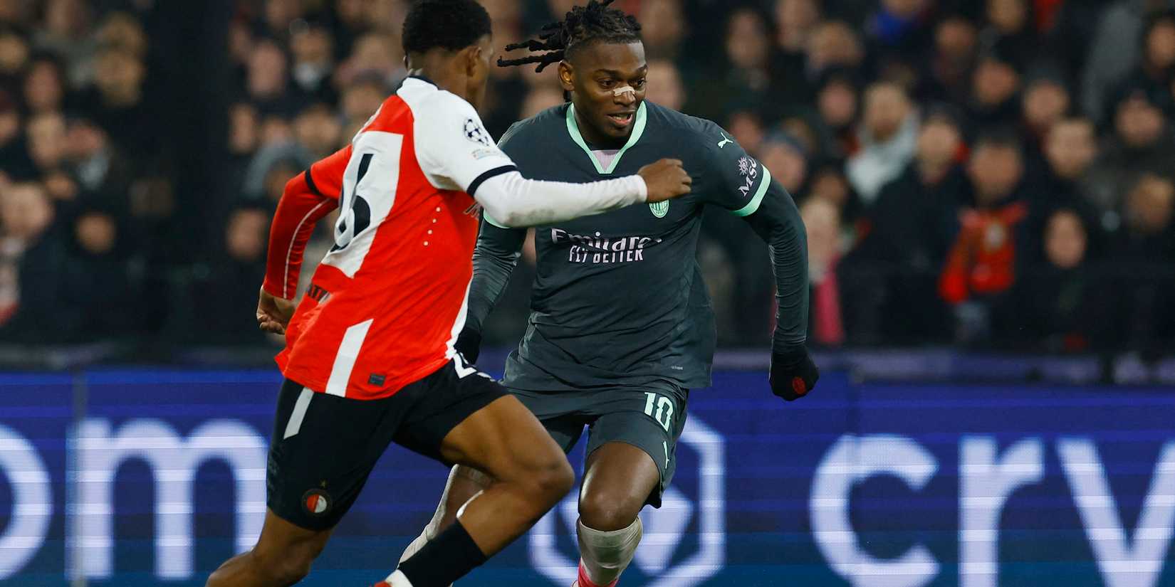 AC Milan's Rafael Leao in action with Feyenoord's Givairo Read