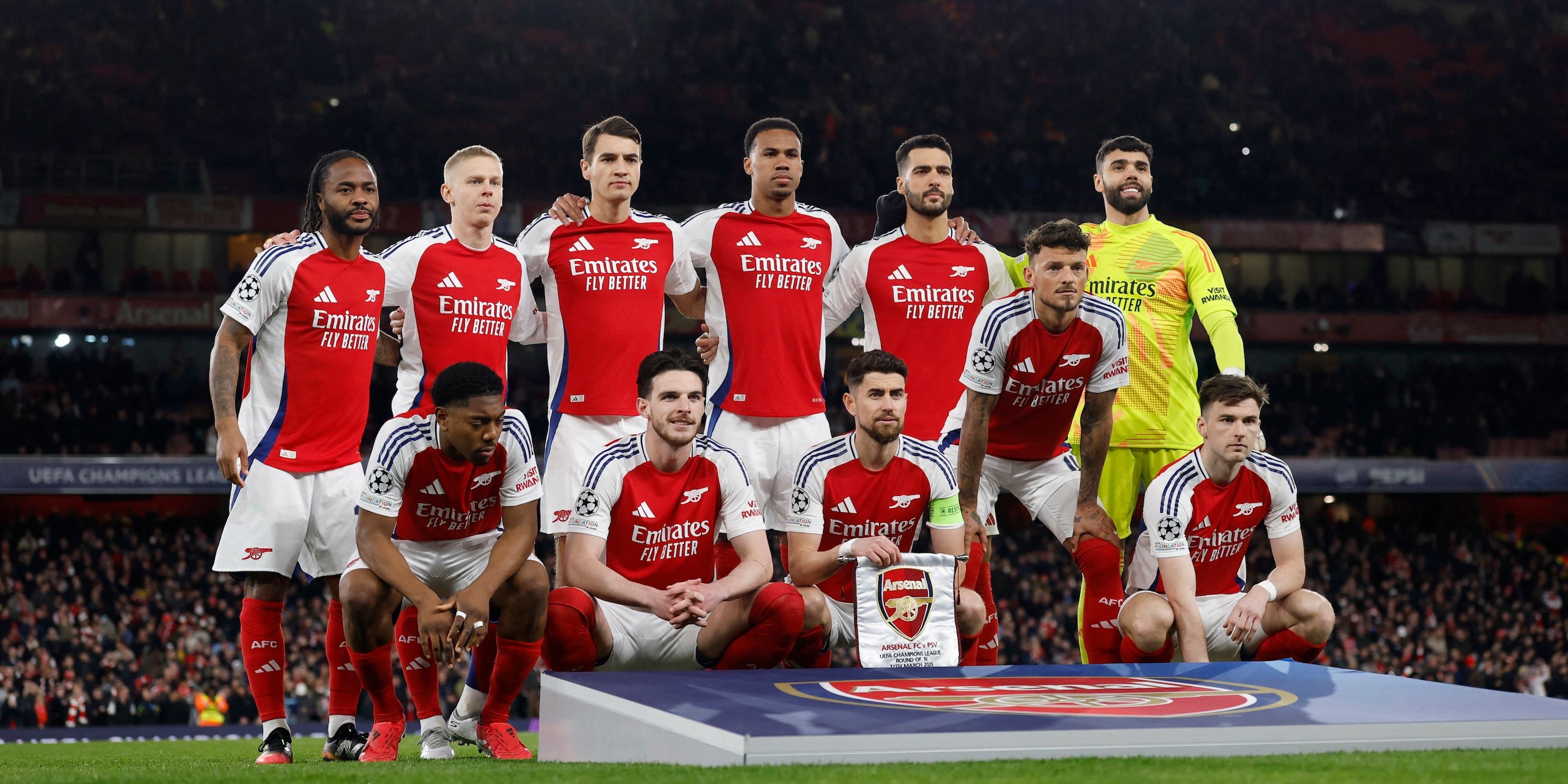 Arsenal players pose for a team group photo before the match 