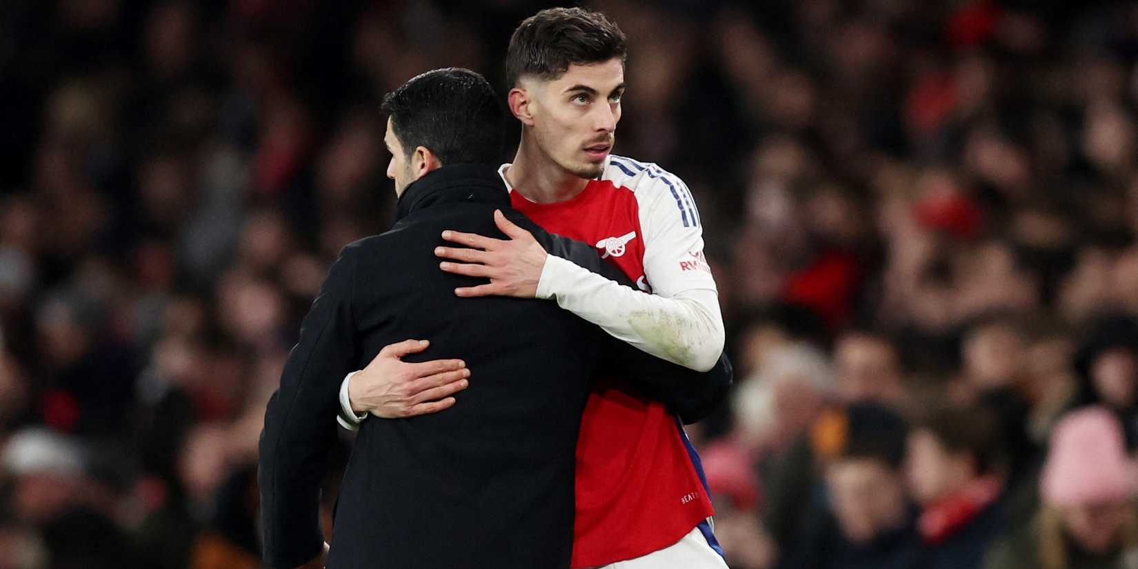 Arsenal's Kai Havertz with manager Mikel Arteta after being substituted