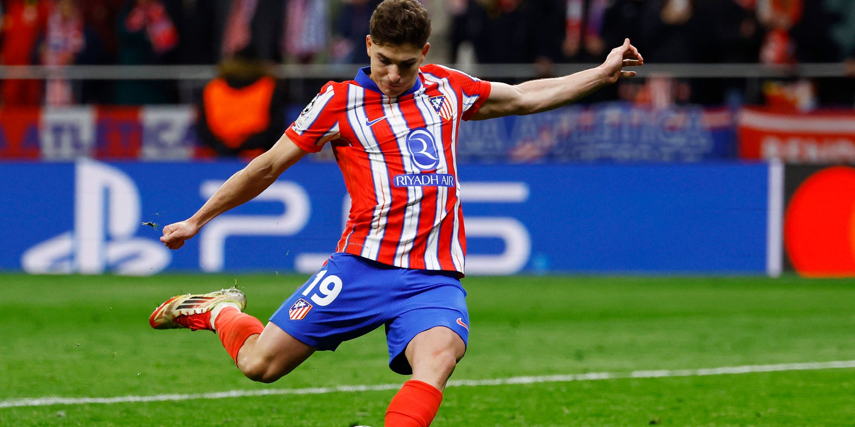 Atletico Madrid's Julian Alvarez scores a penalty during the penalty shootout wich is later disallowed after a VAR review