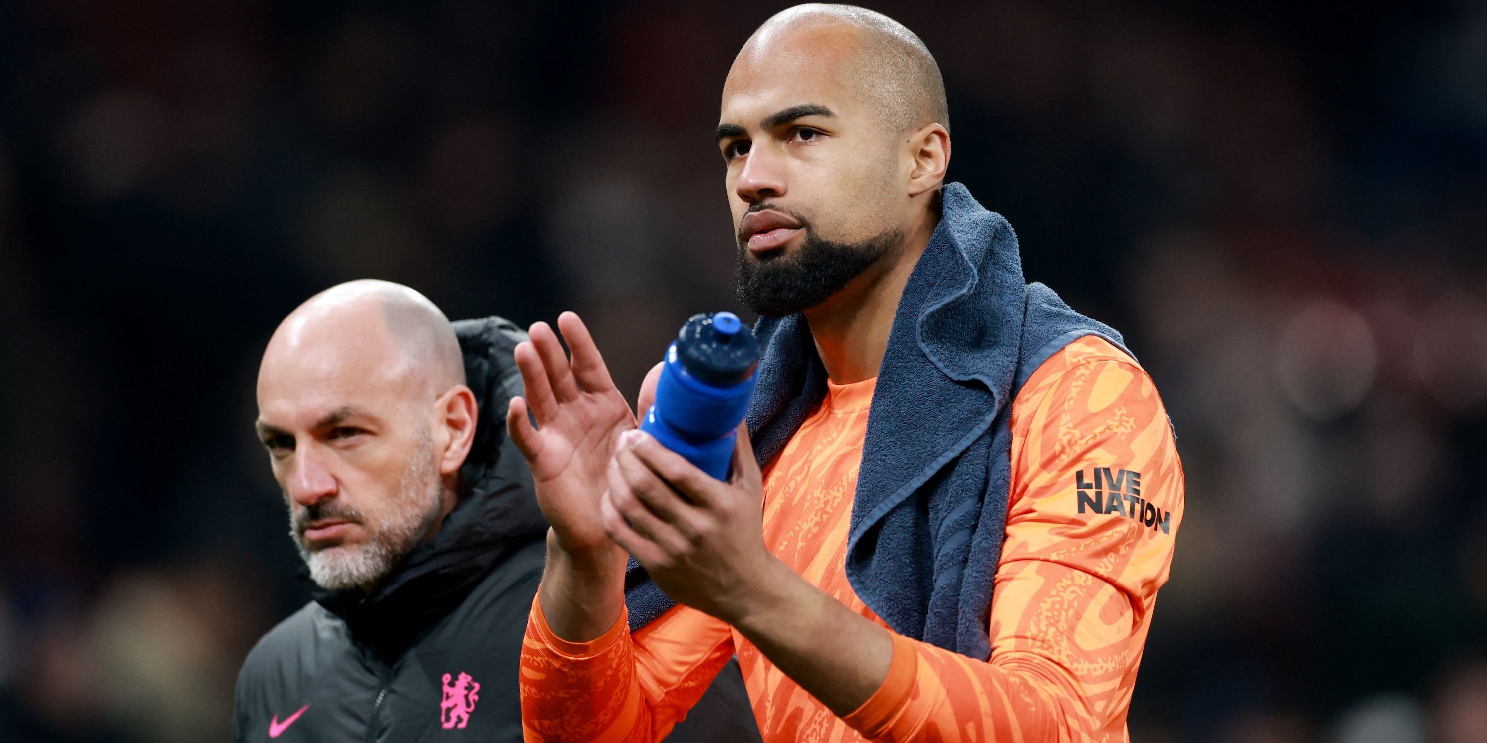 Chelsea's Robert Sanchez applauds fans after the match