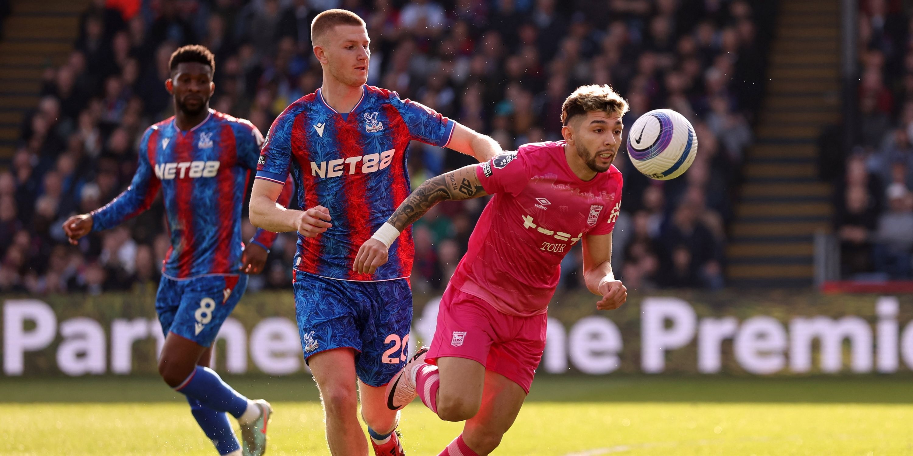 Crystal Palace's Adam Wharton in action with Ipswich Town's Julio Enciso