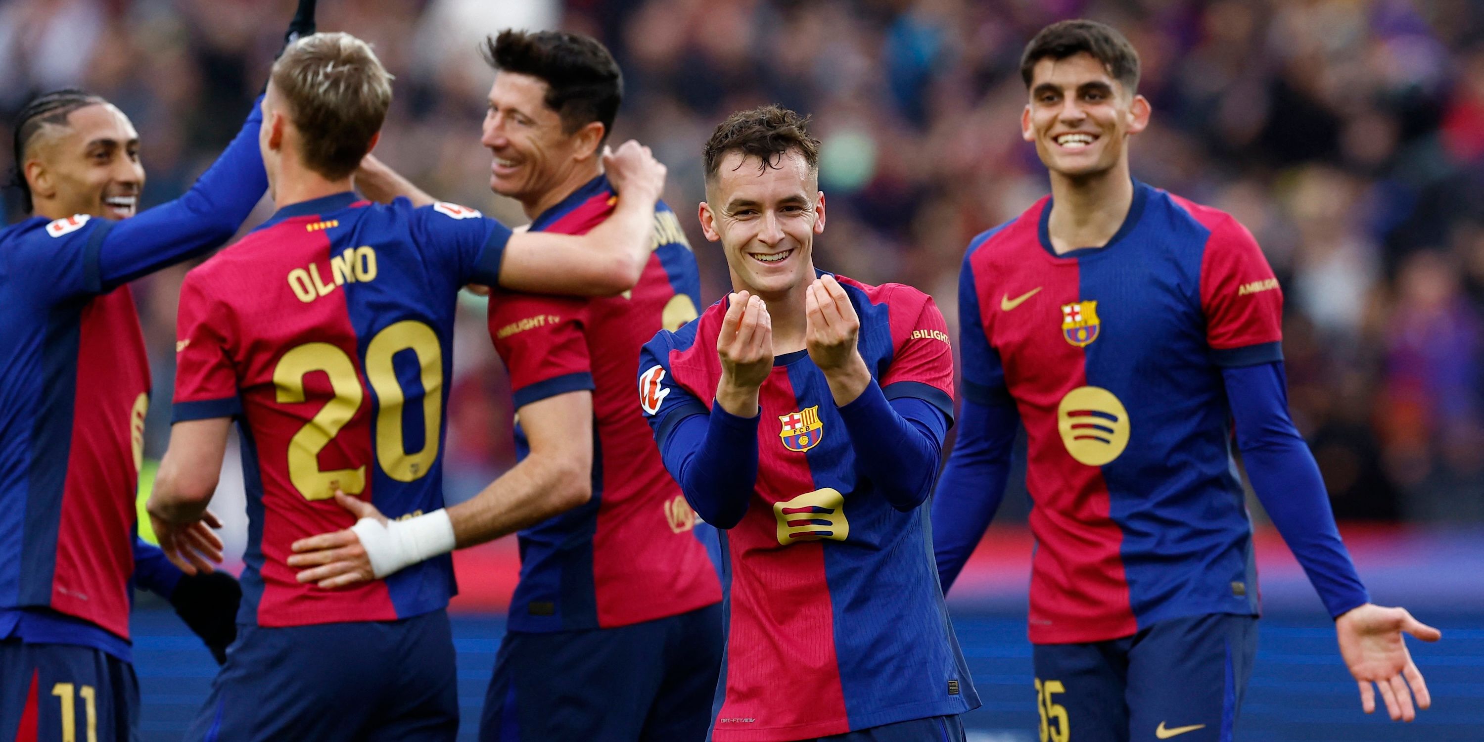 Mark Cassado from Barcelona is celebrating their second goal with his teammates