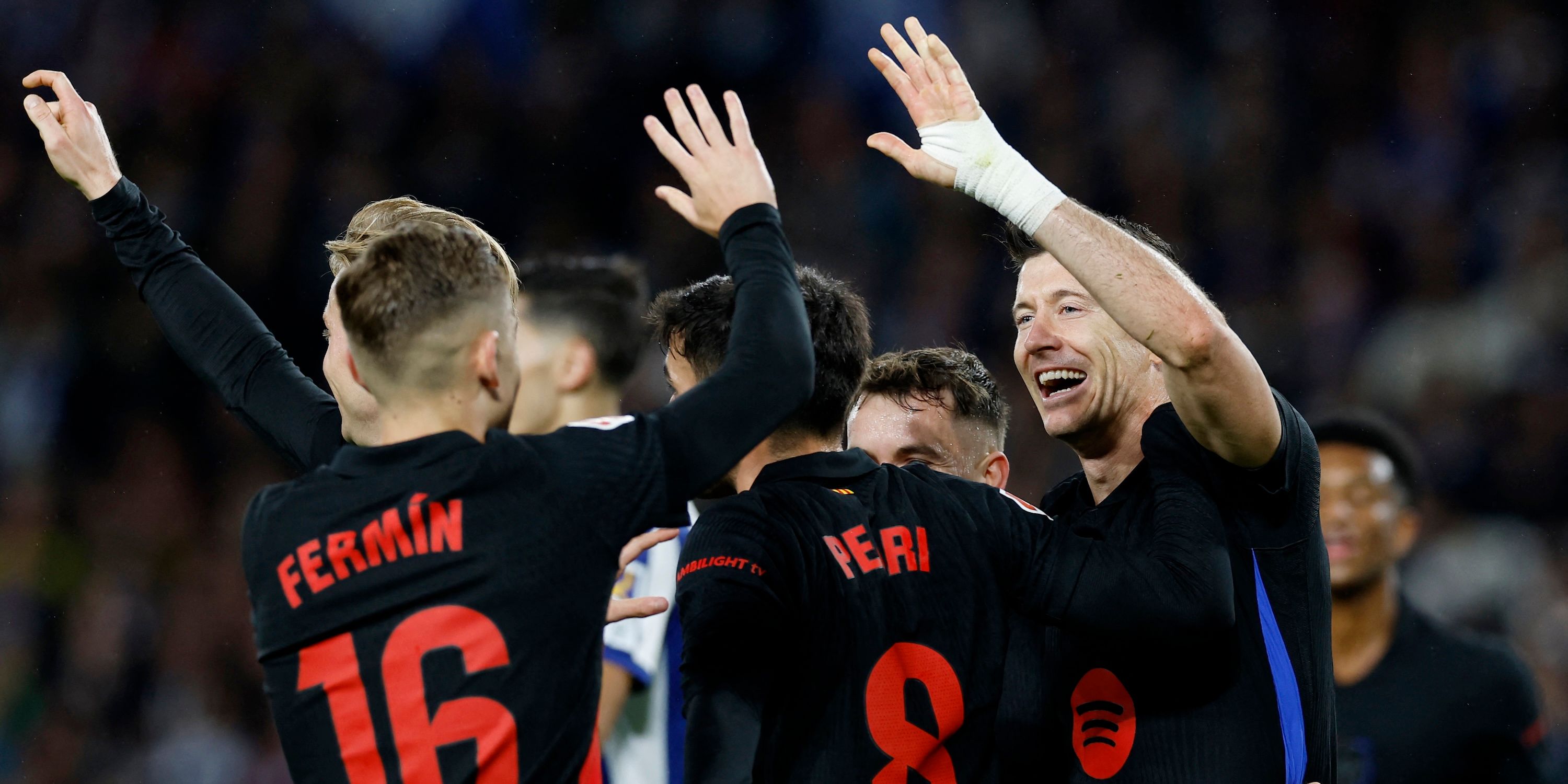 FC Barcelona's Robert Lewandowski celebrates scoring their first goal with Pedri and Fermin Lopez