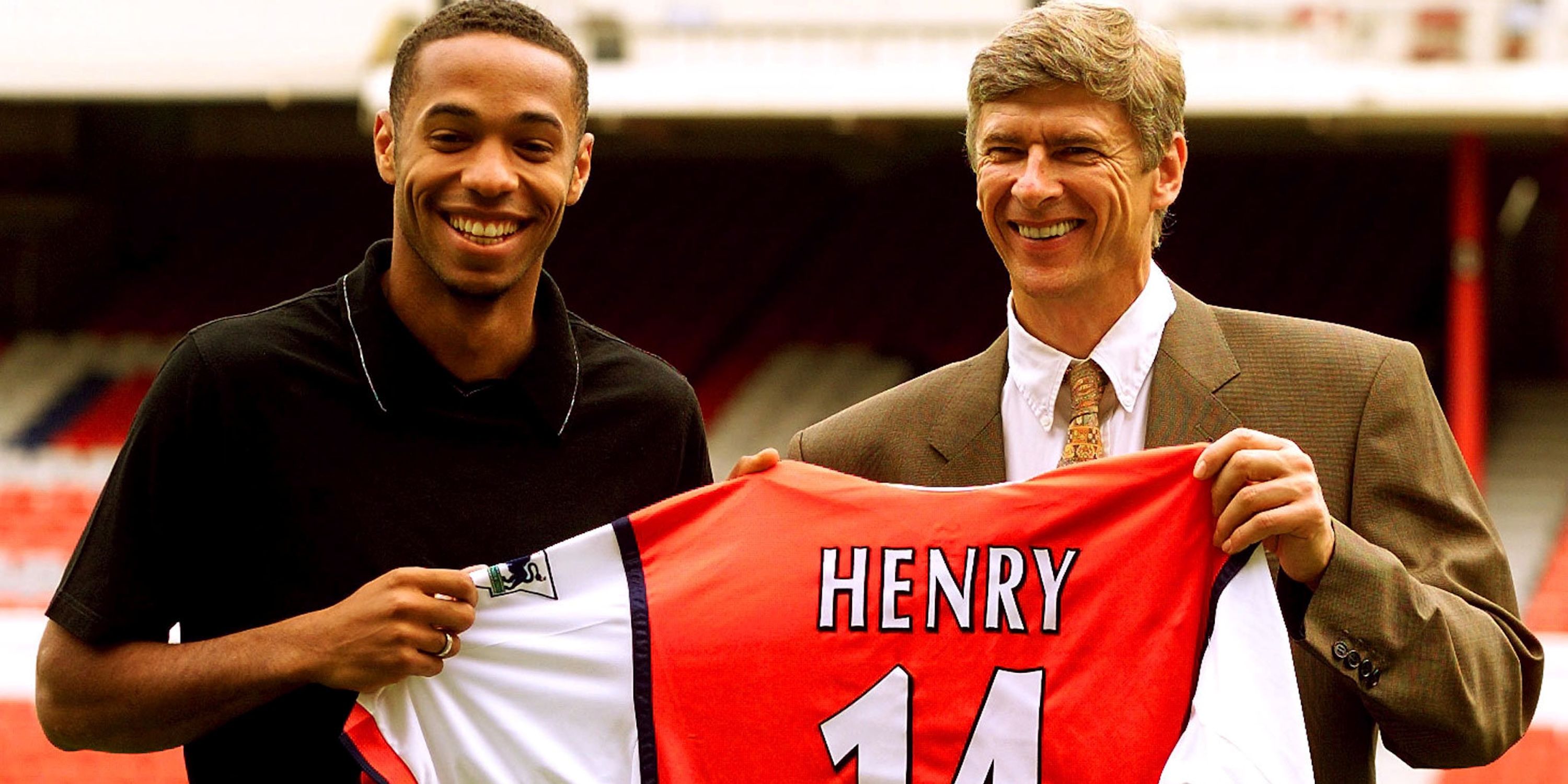 French international striker Terry Henry is smiling with director Arsene Wenger