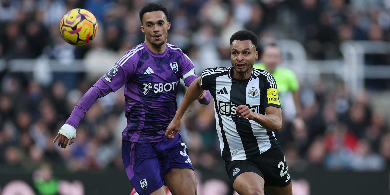 Fulham's Antonee Robinson in action with Newcastle United's Jacob Murphy