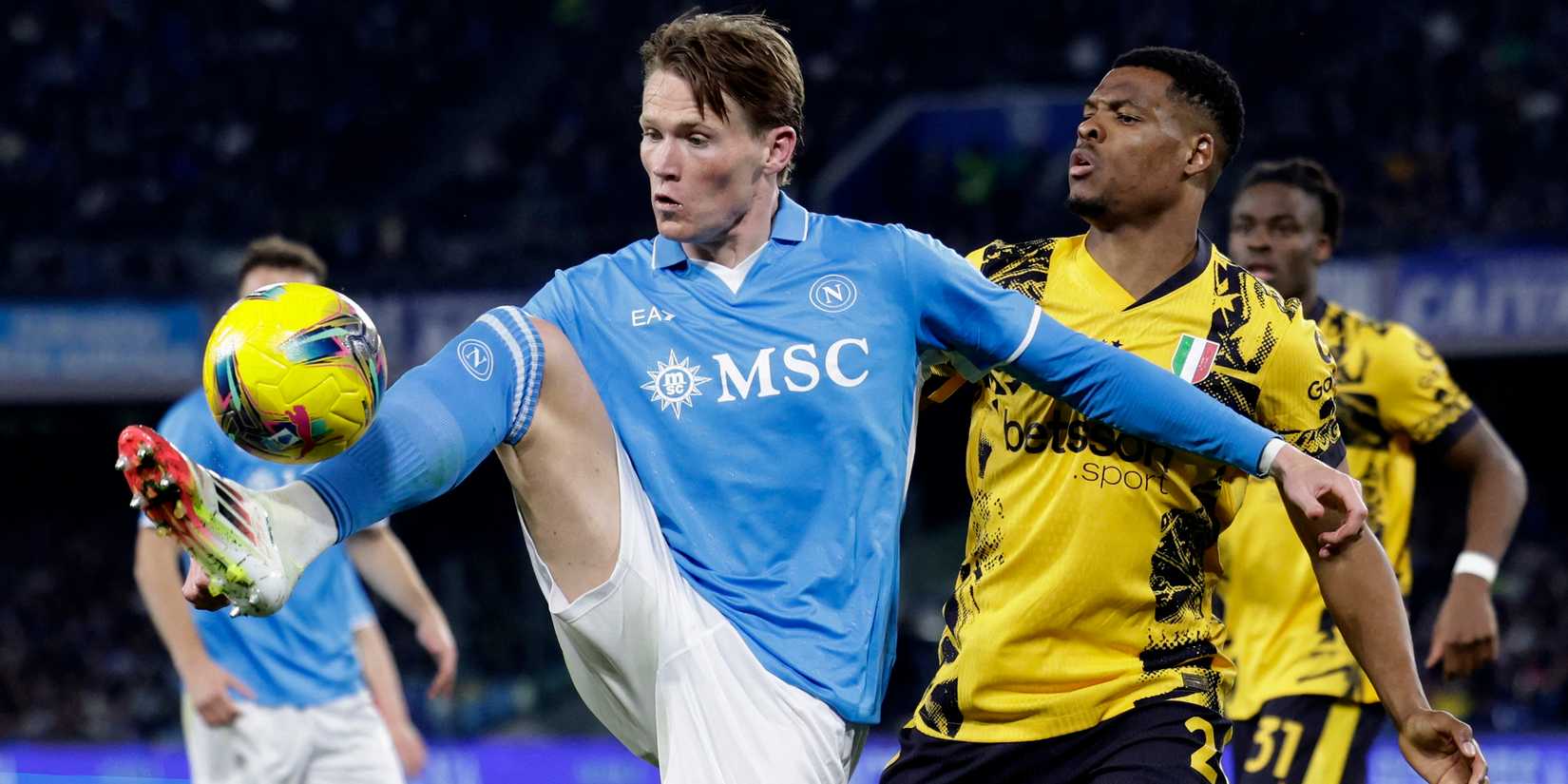 Inter Milan's Denzel Dumfries in action with Napoli's Scott McTominay