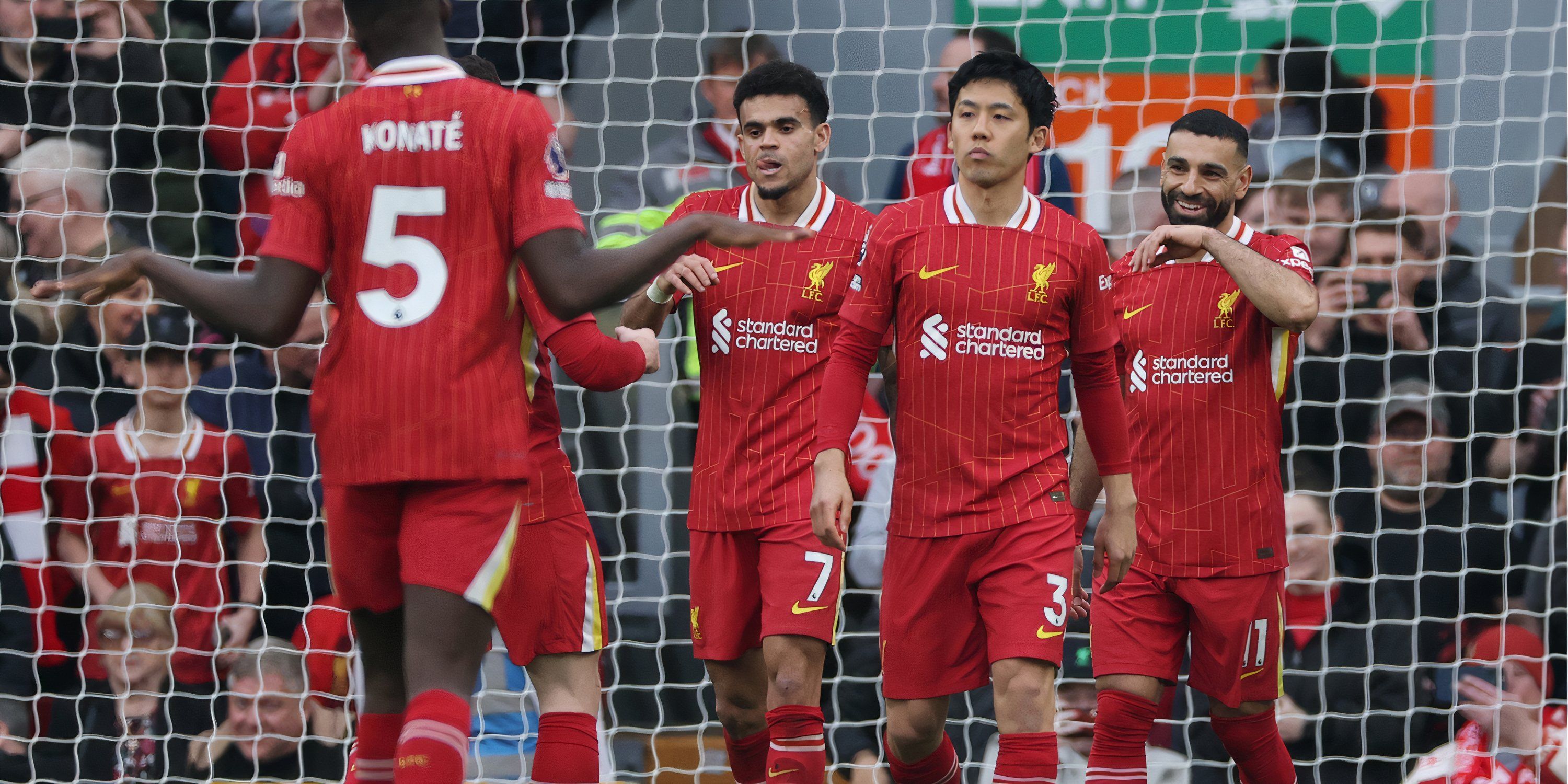 Liverpool players celebrate Mo Salah's goal