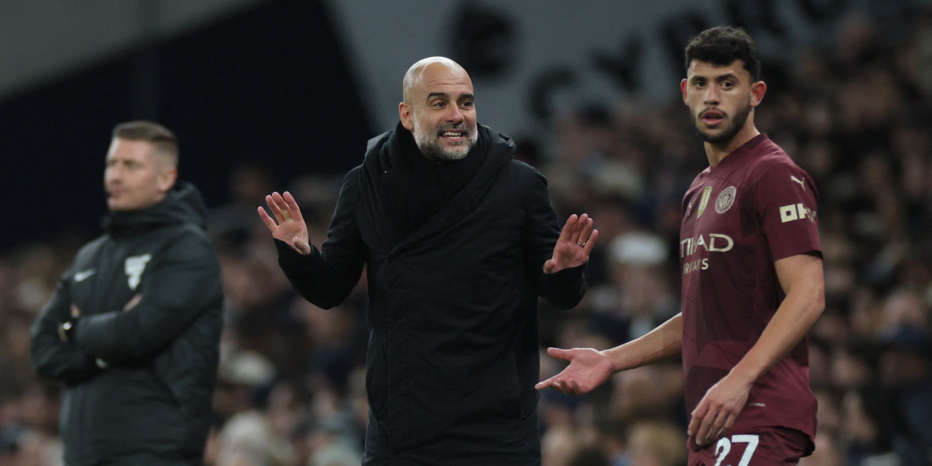 Manchester City manager Pep Guardiola and Matheus Nunes react