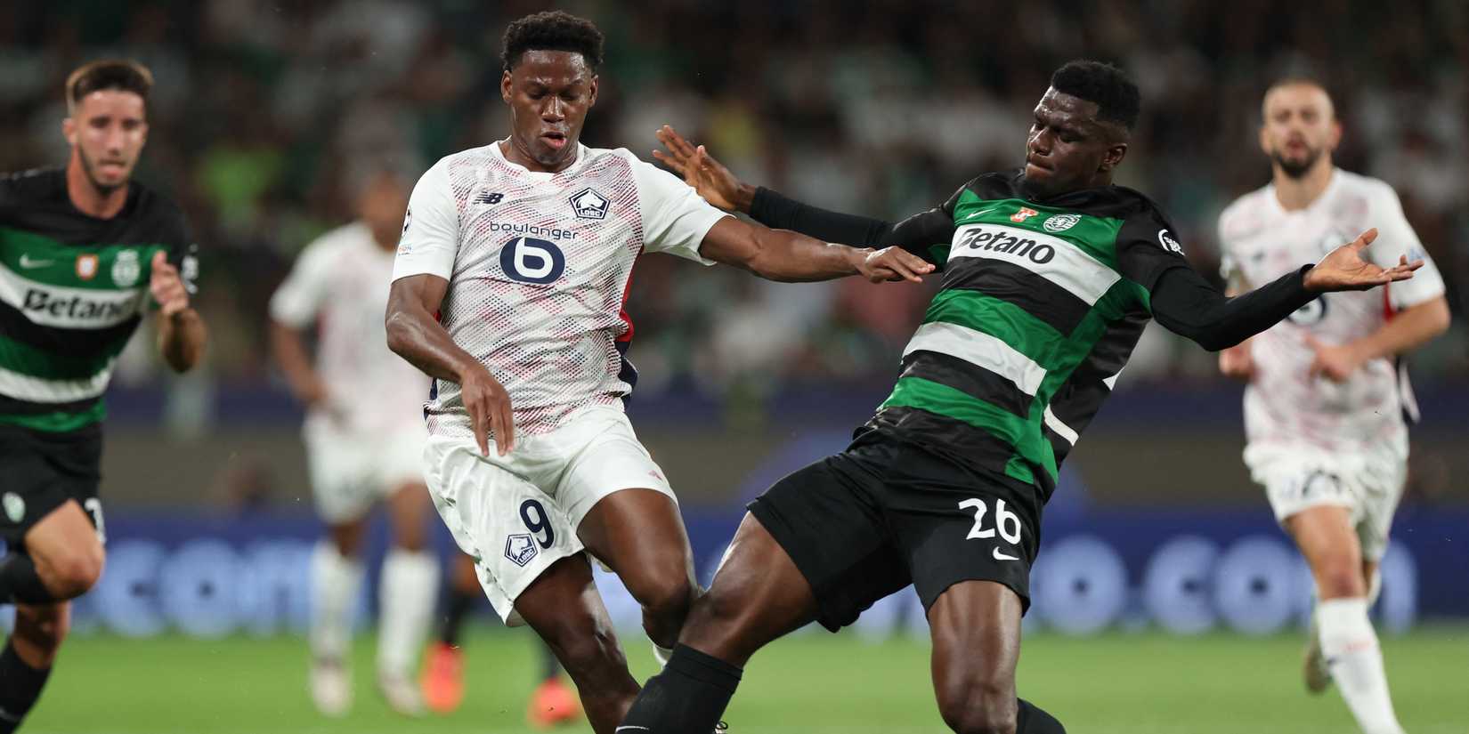 Sporting CP's Ousmane Diomande in action with Lille's Jonathan David