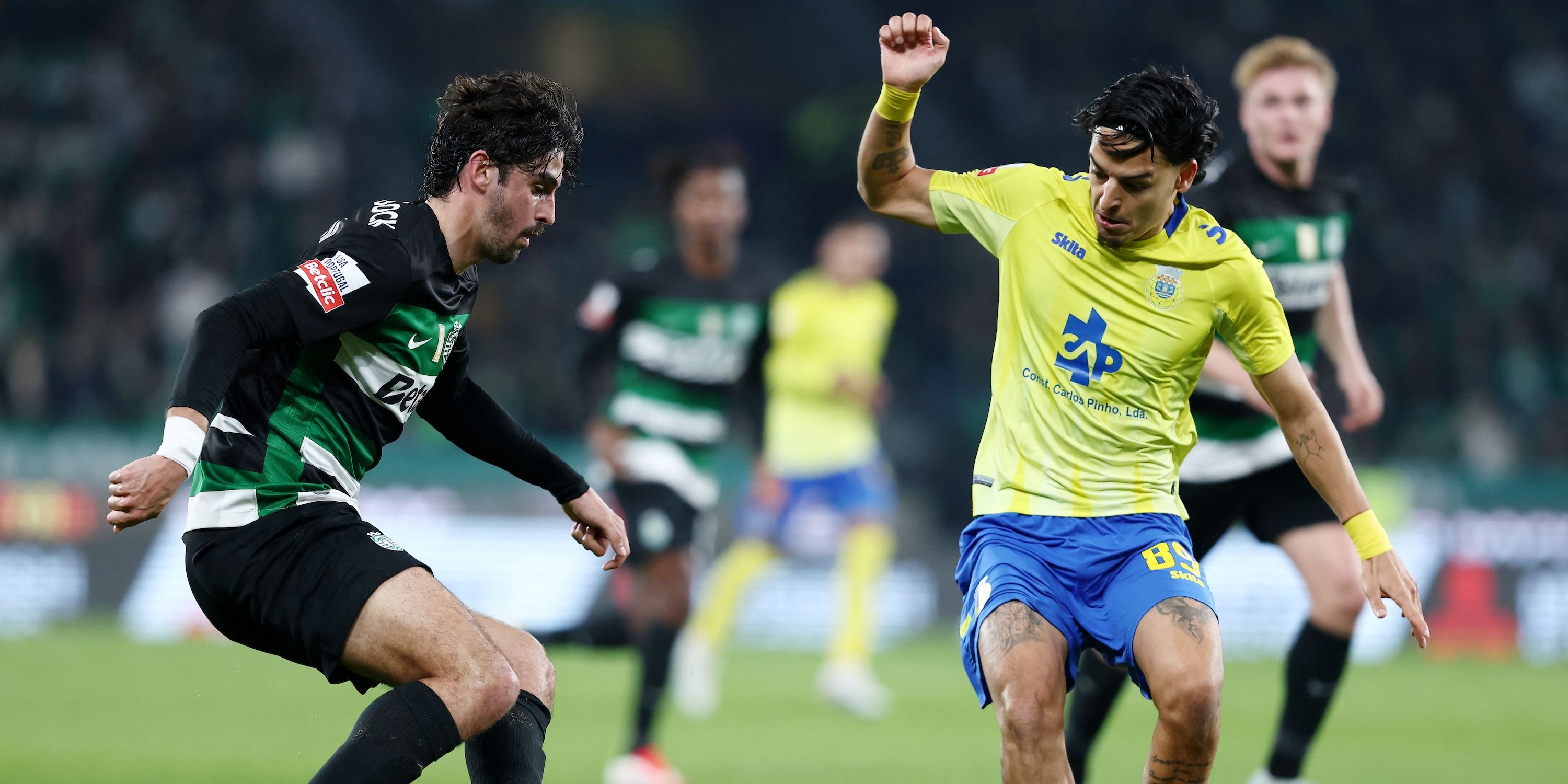 CP's Trinkao Sporting in Action with Arouca's Pedro Santos