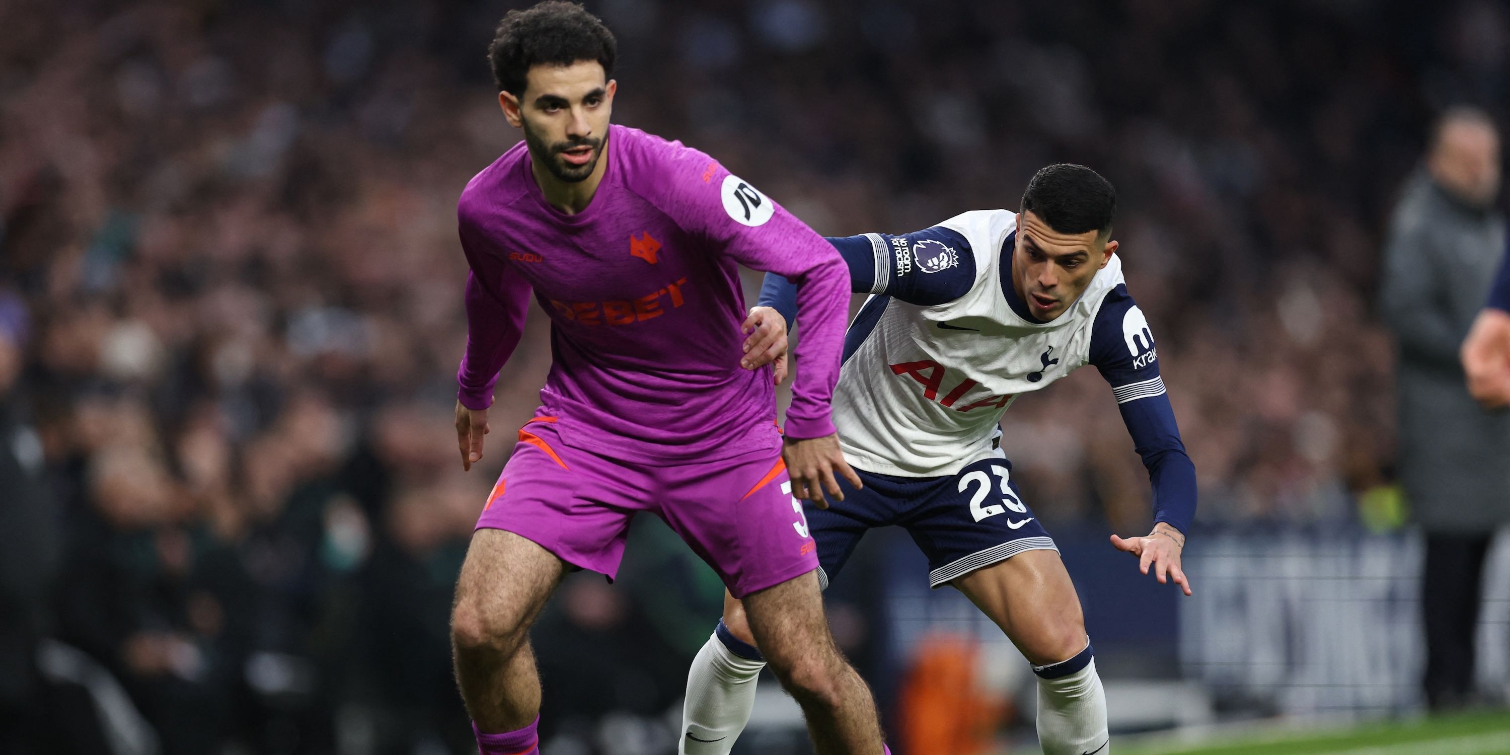 Wolverhampton Wanderers' Rayan Ait-nouri acts with Tottenham's Pedro Porro