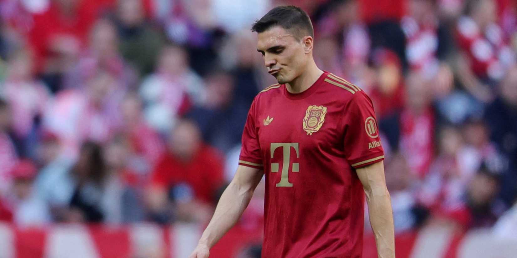 Bayern Munich`s Joao Palhinha looks dejected as he walks off after receiving a red card