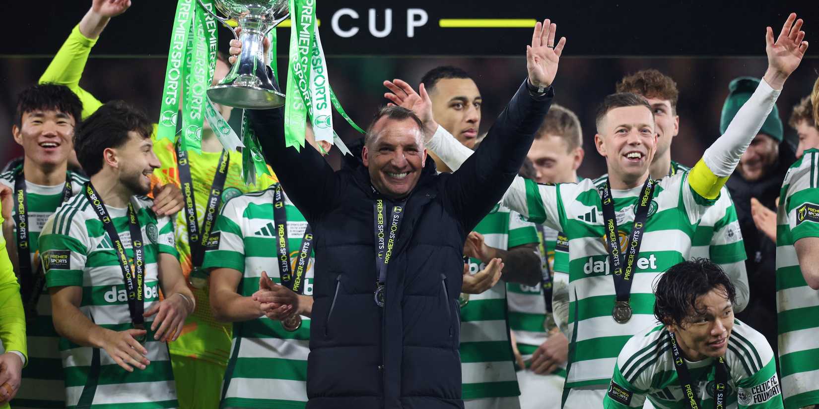 Celtic manager Brendan Rodgers celebrates with the trophy after winning the League Cup