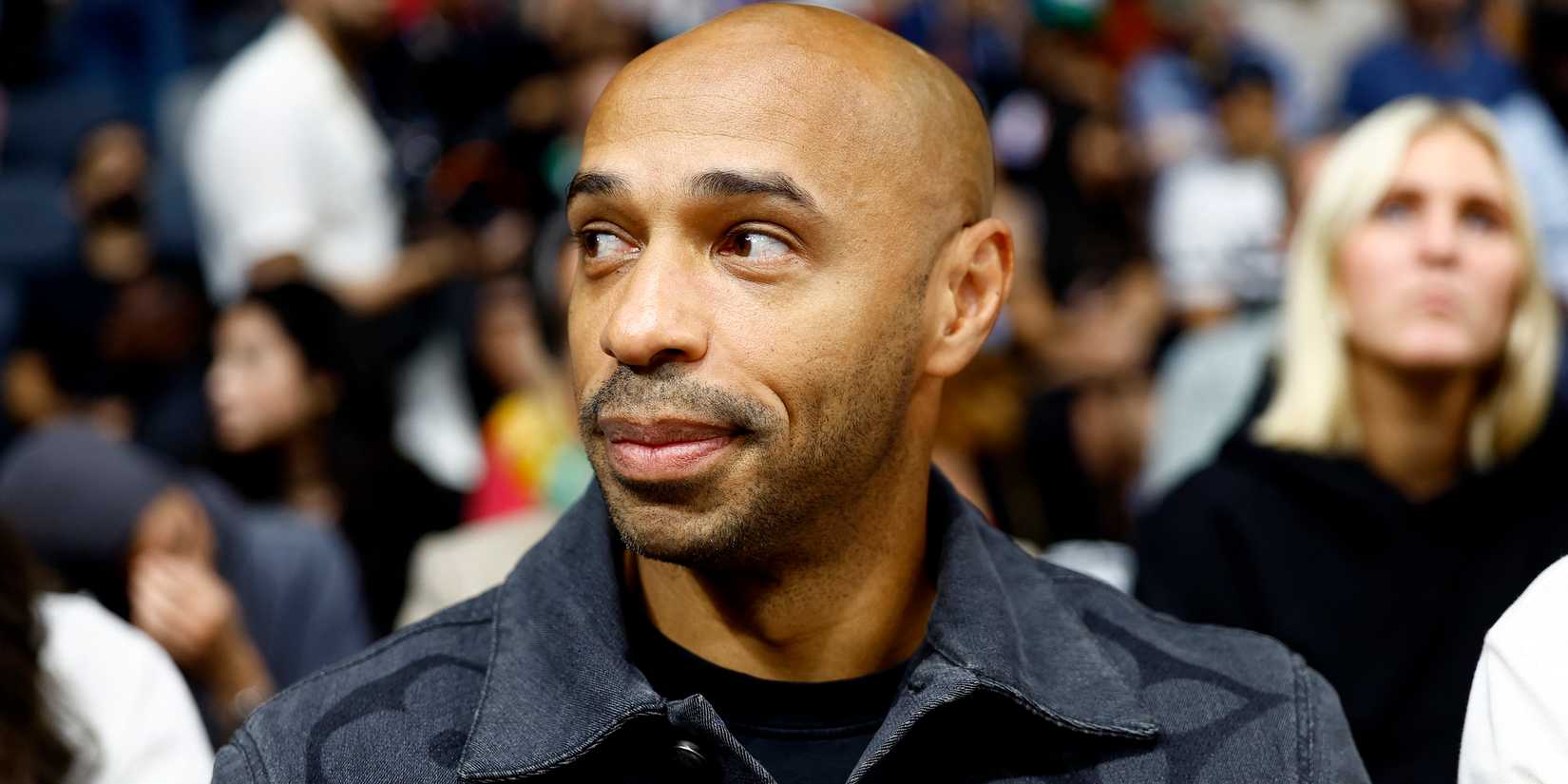 Former football player Terry Henry is watching the game
