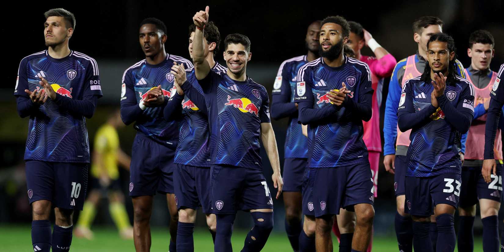 Leeds United's Manor Solomon celebrates after the match with teammates
