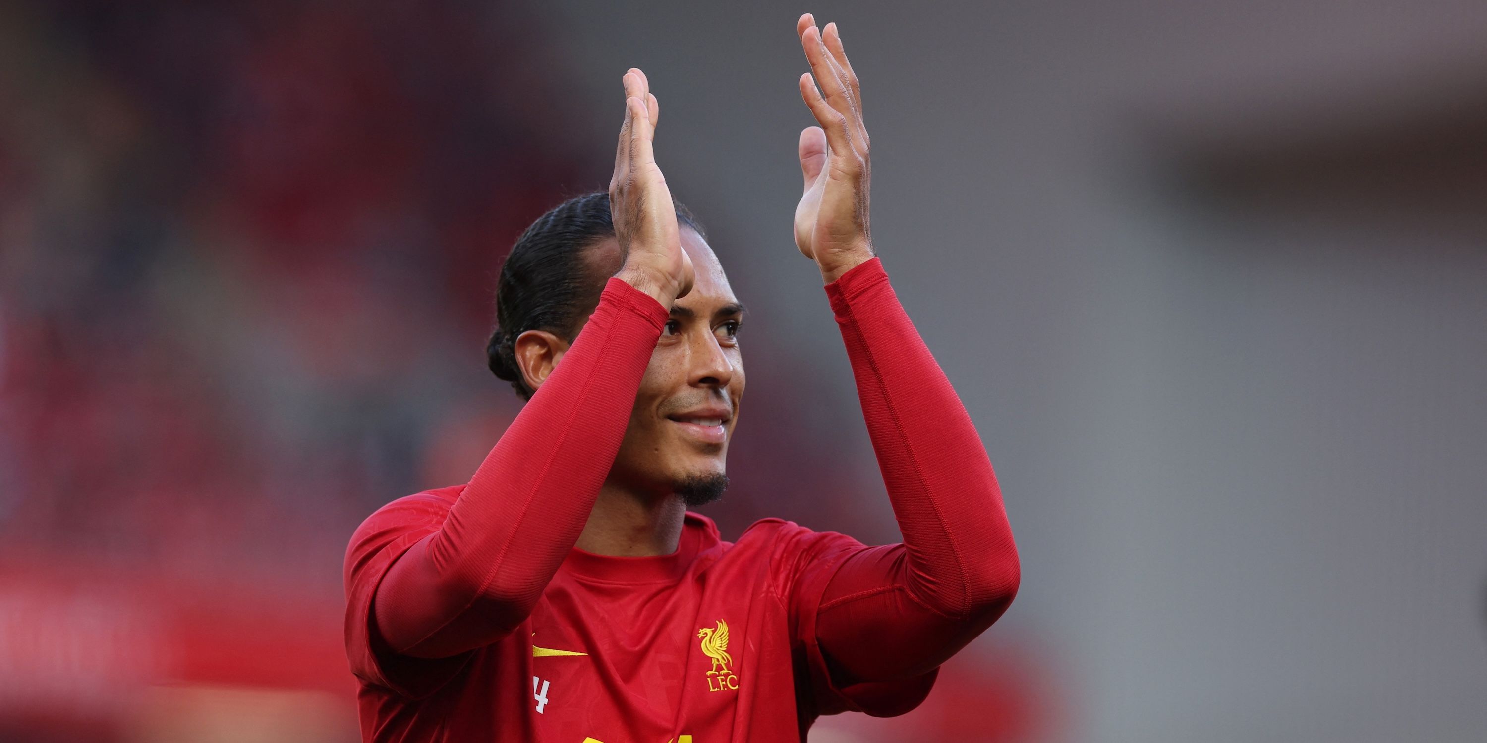 Liverpool's Virgil Van Dijk applauded the supporters before the match
