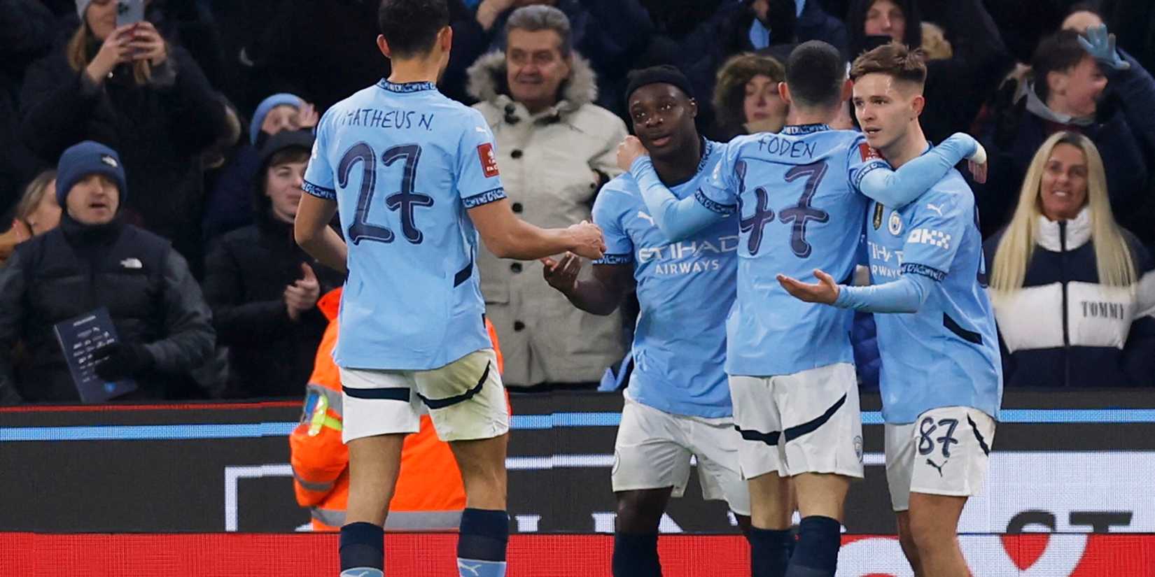 Manchester City's James McAtee celebrates scoring their fifth goal with Phil Foden and Divin Mubama