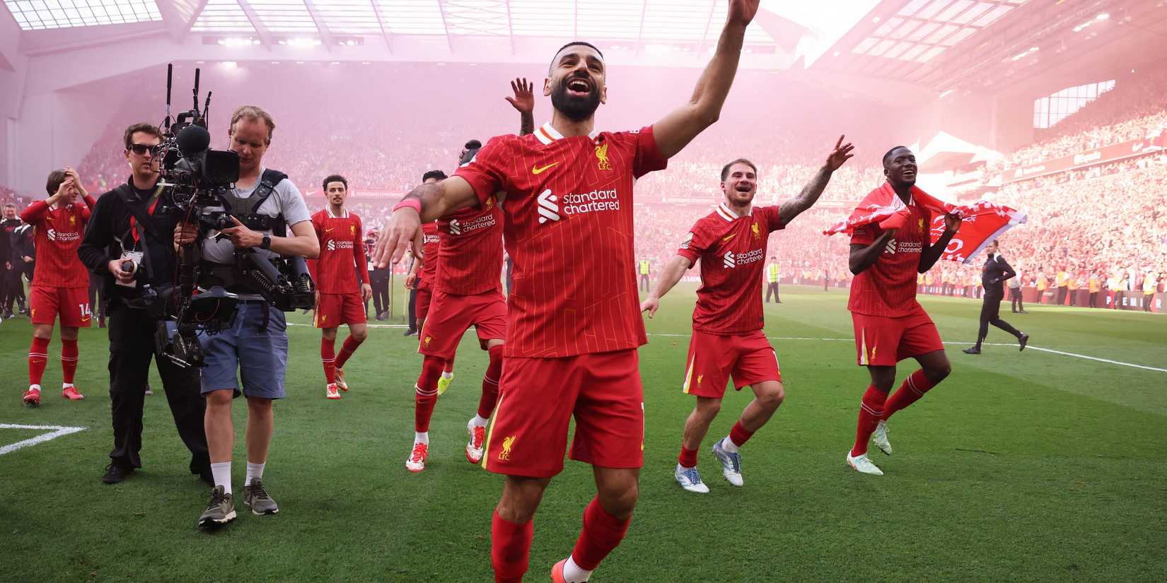 Mohamed Salah celebrates Liverpool's Premier League triumph