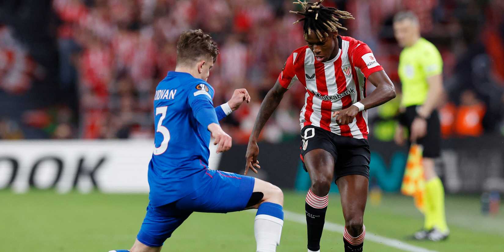 Athletic Bilbao's Nico Williams in action with Rangers' Ridvan Yilmaz 