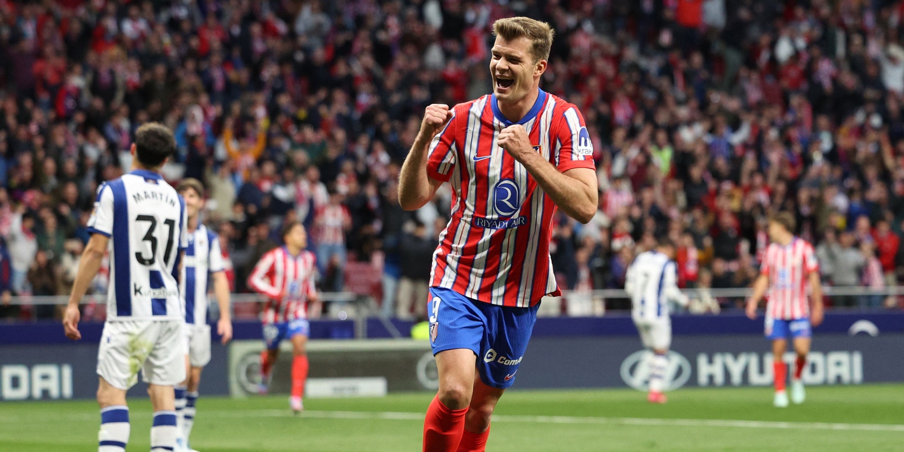 Alexander Surloth of Aleteltesto Madrid celebrates his second goal 
