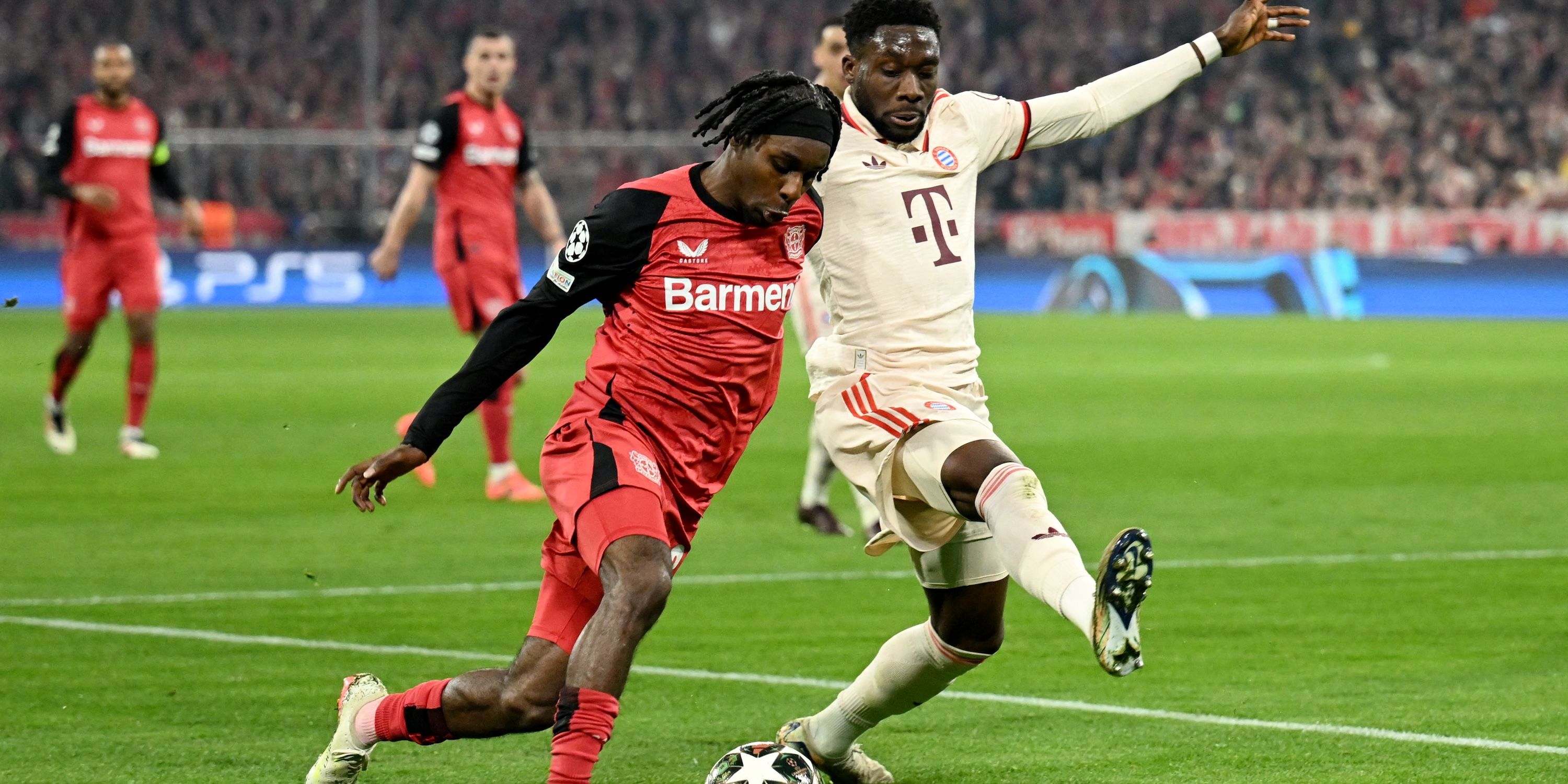 Alphonso Davies's Bayern Munich in Action with Jeremie Frimpong from Bayer Leverkusen