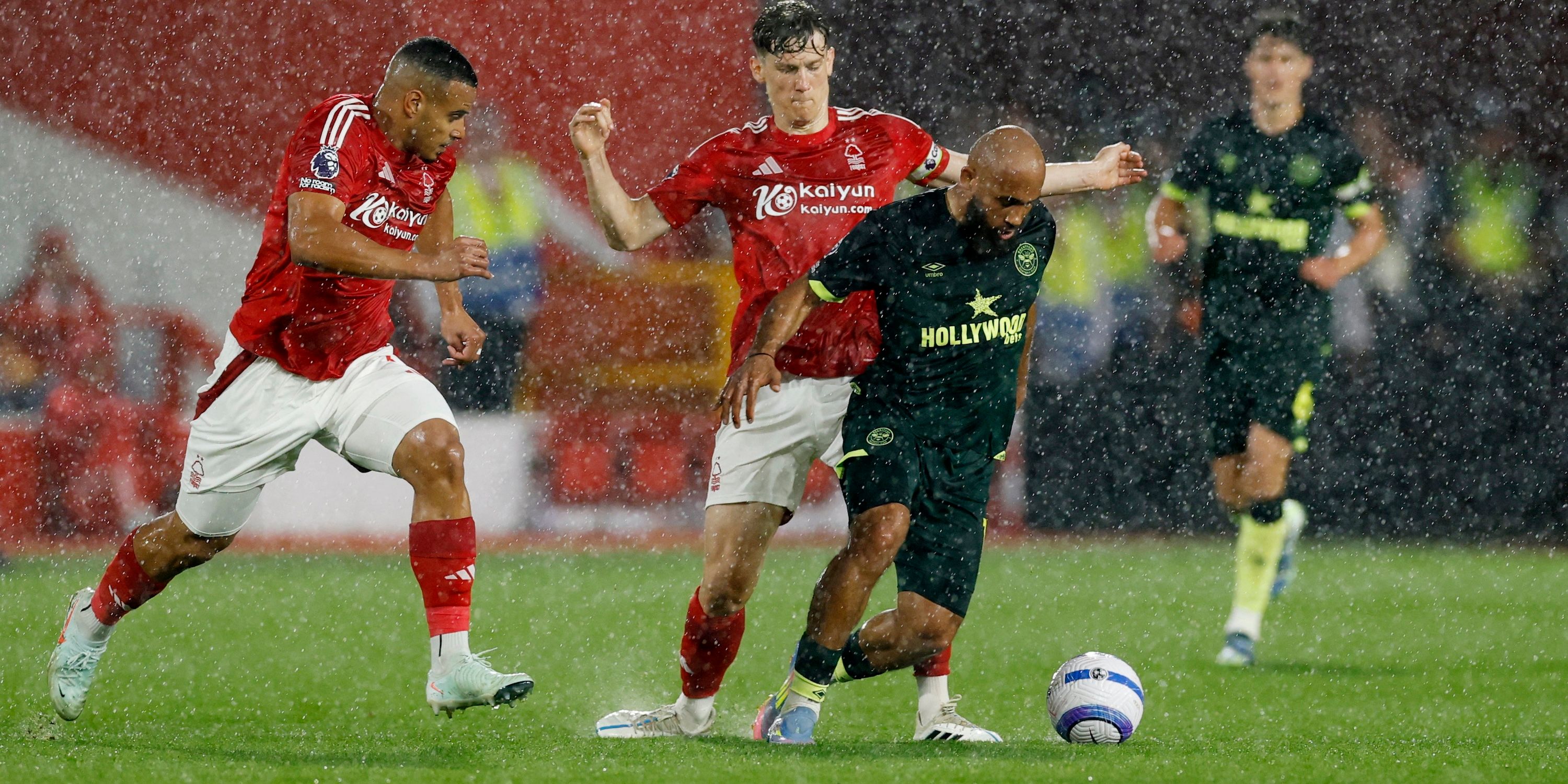 Brentford's Bryan Mbeumo in action with Nottingham Forest's Murillo and Nottingham Forest's Ryan Yates