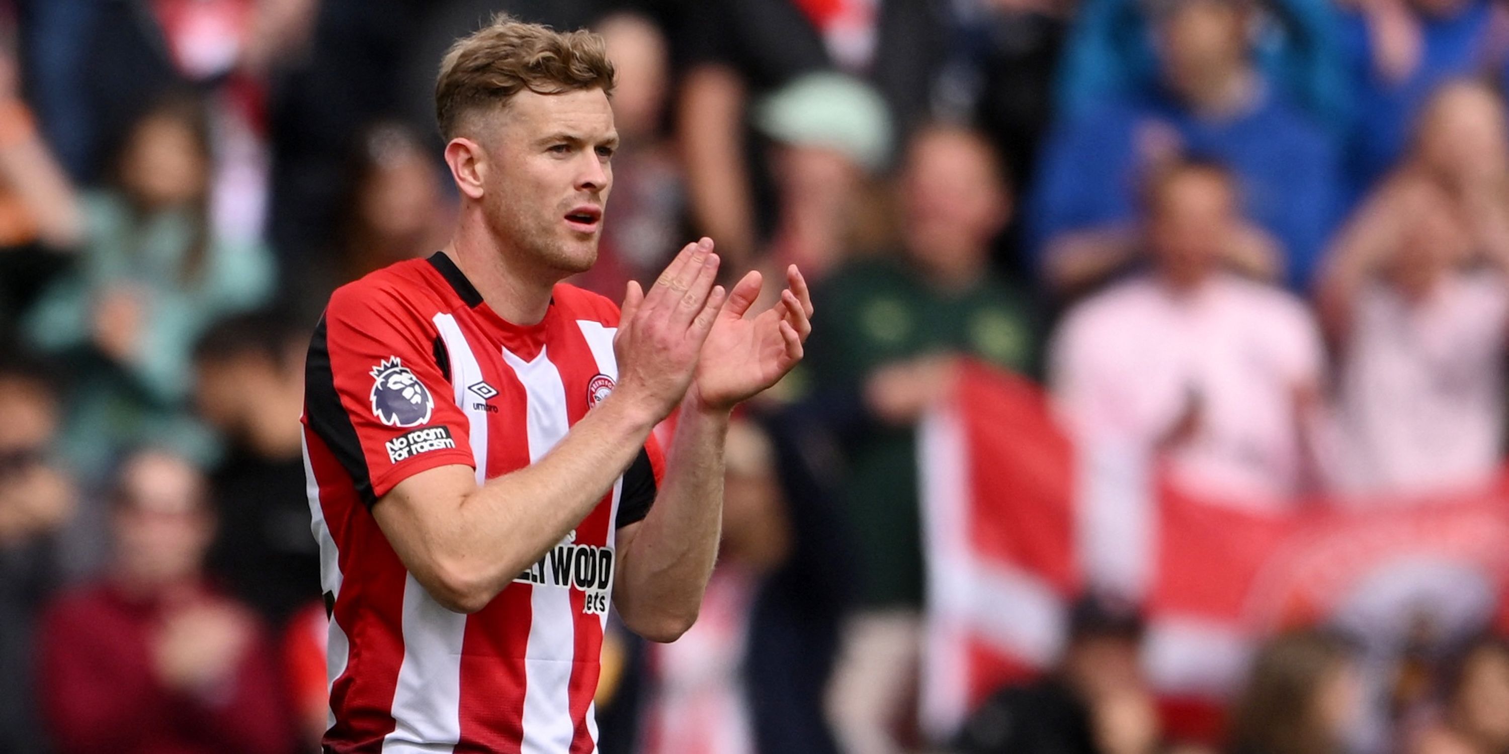 Brentford's Nathan Collins applauds